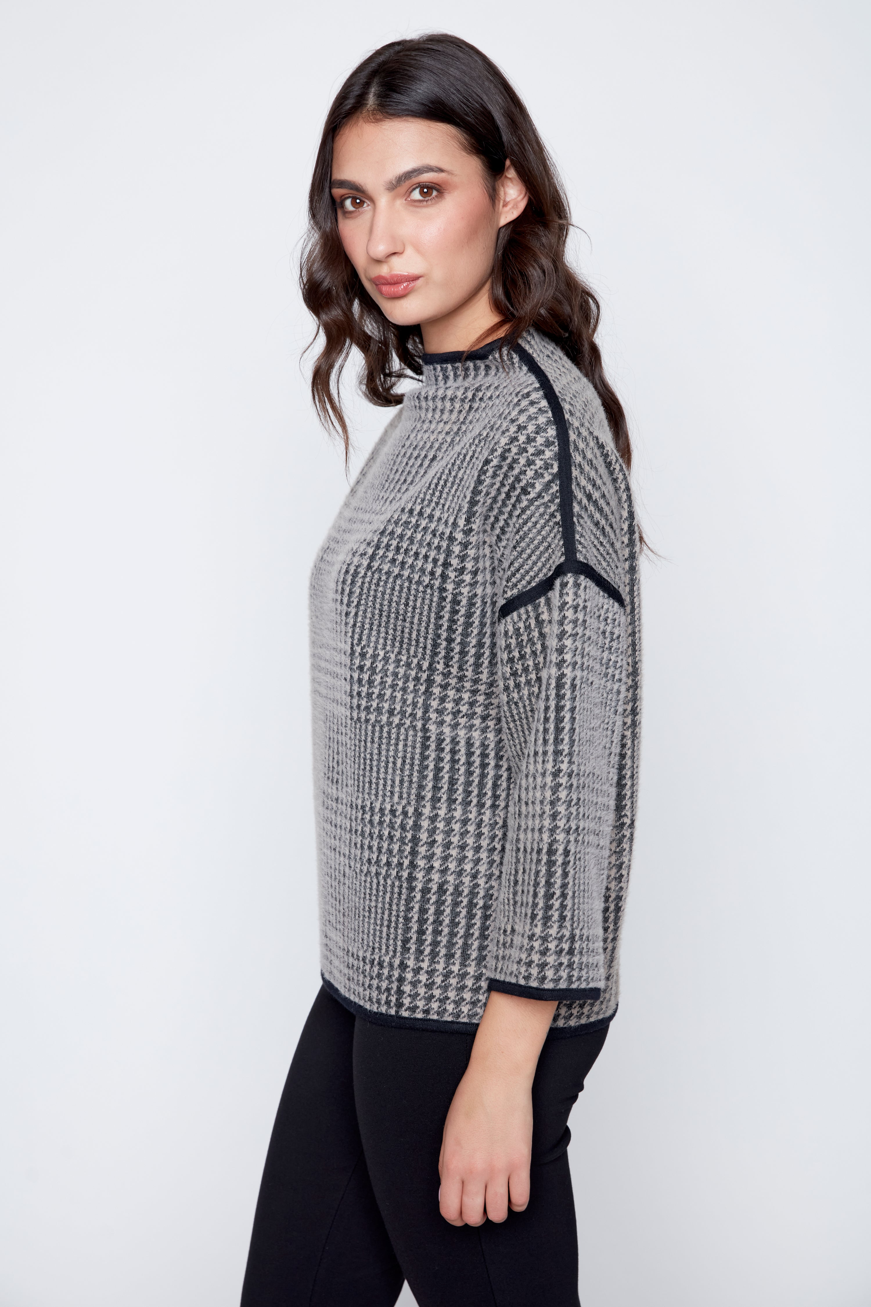 Le pull jacquard à cils