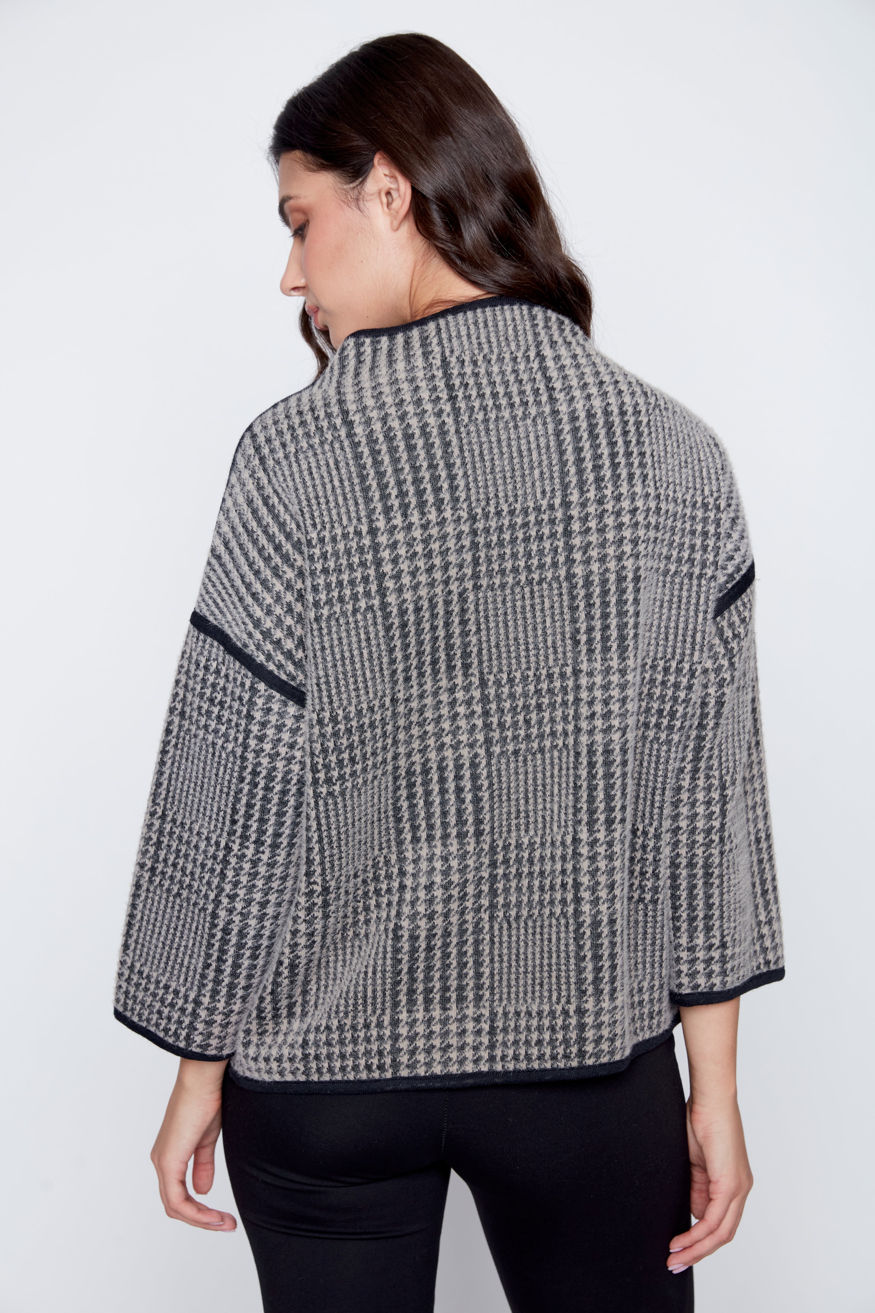 Le pull jacquard à cils
