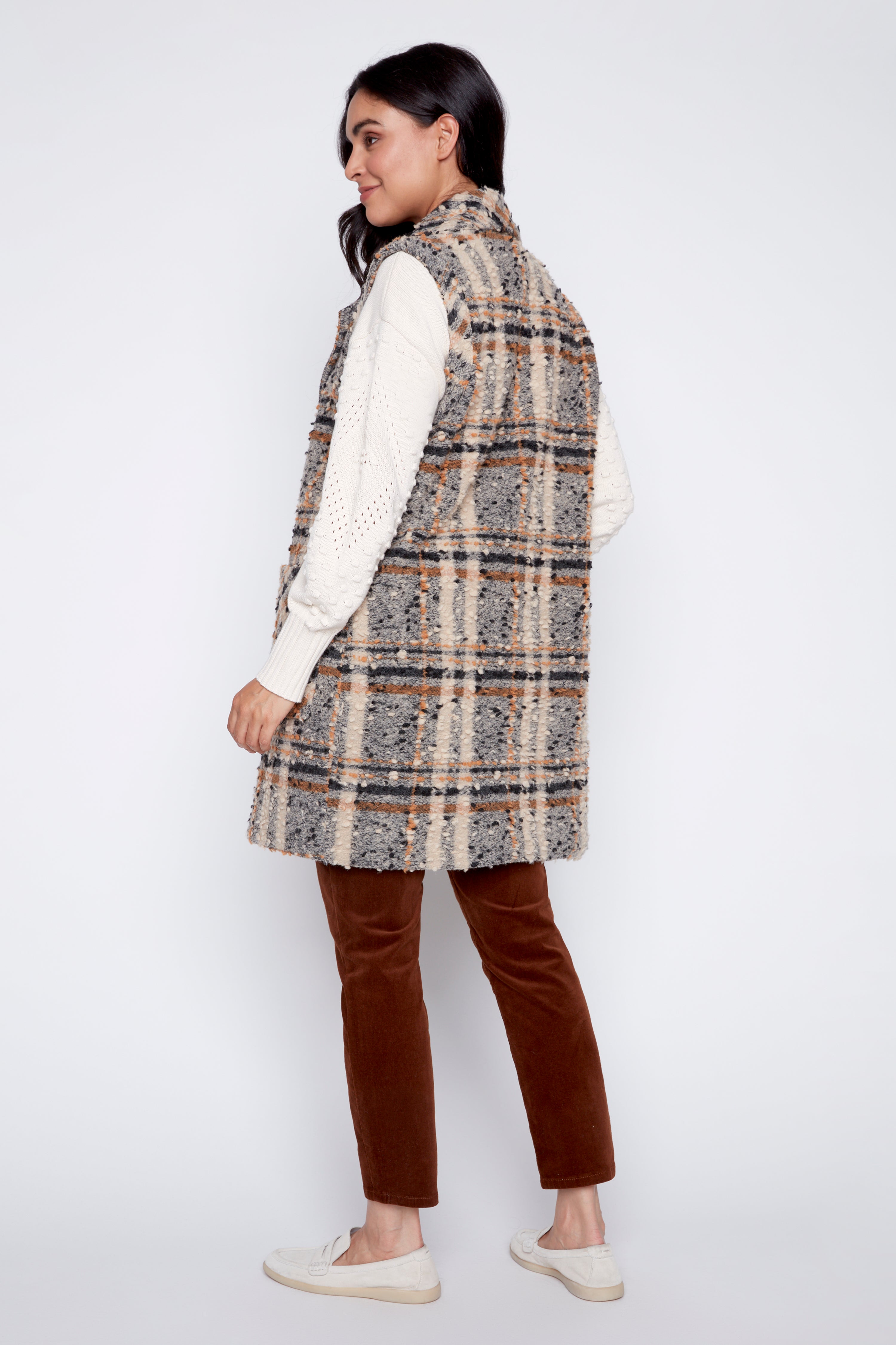 Le gilet à carreaux en laine mélangée