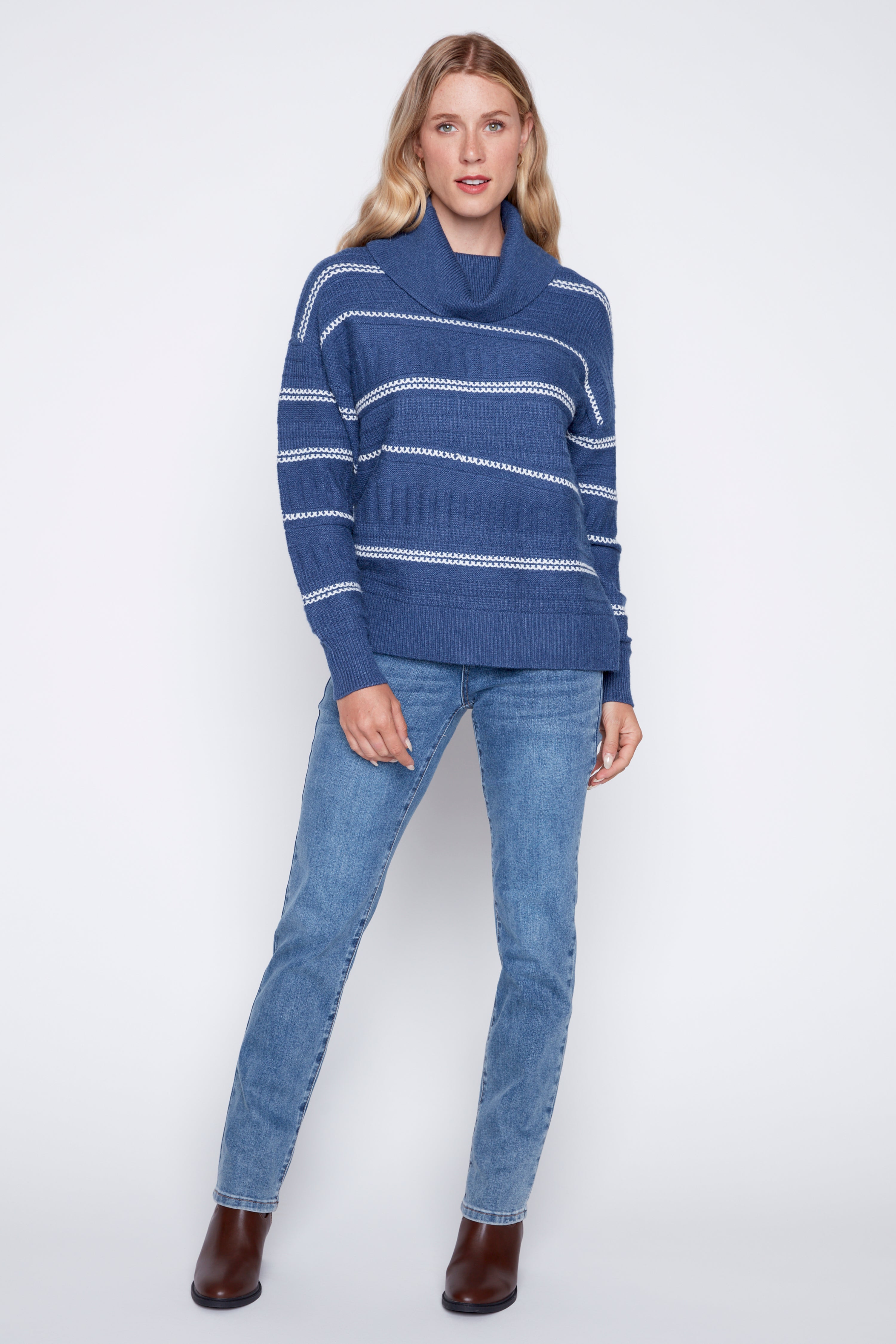 Le pull à col bénitier à rayures