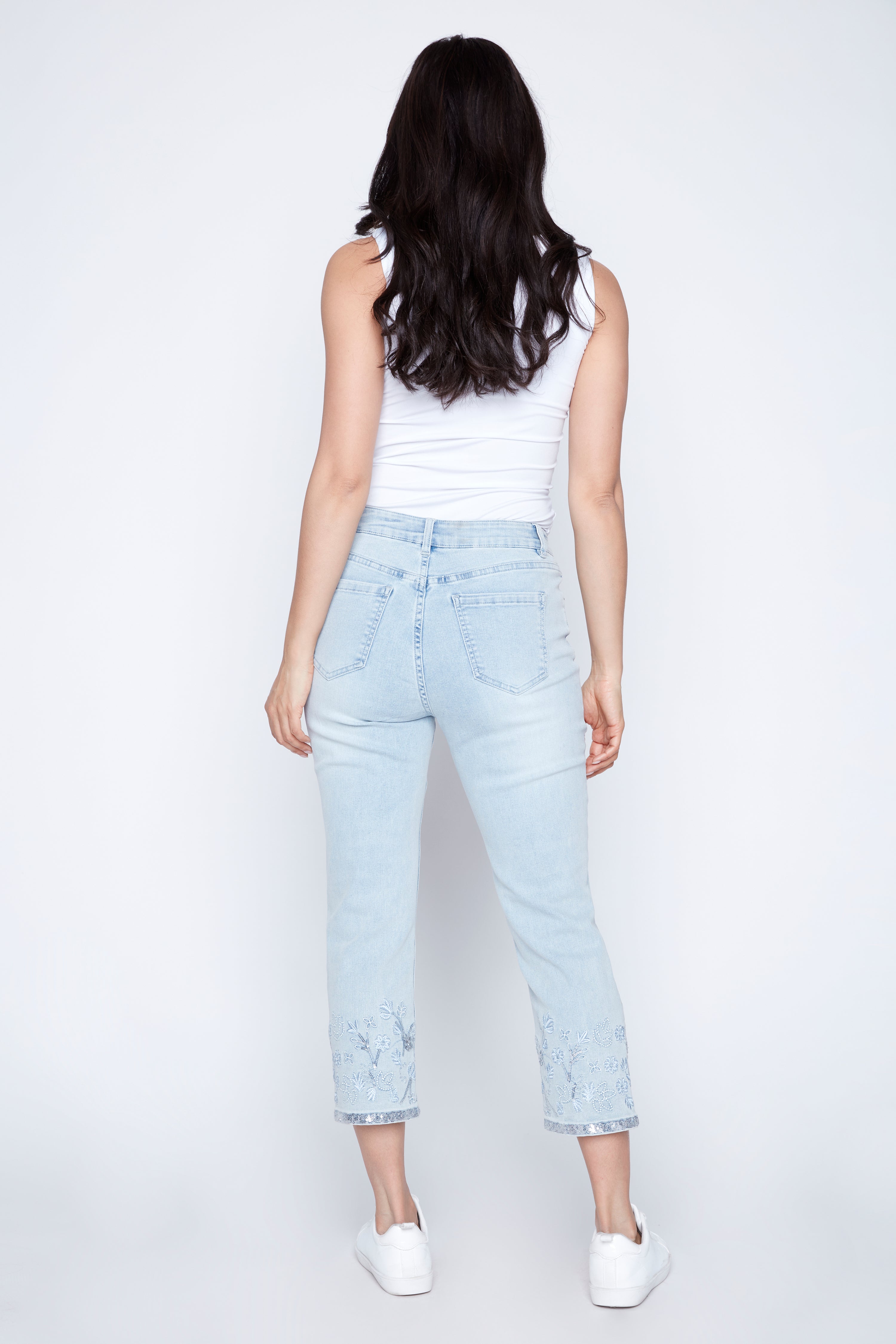 Slim leg embroidered hem jean