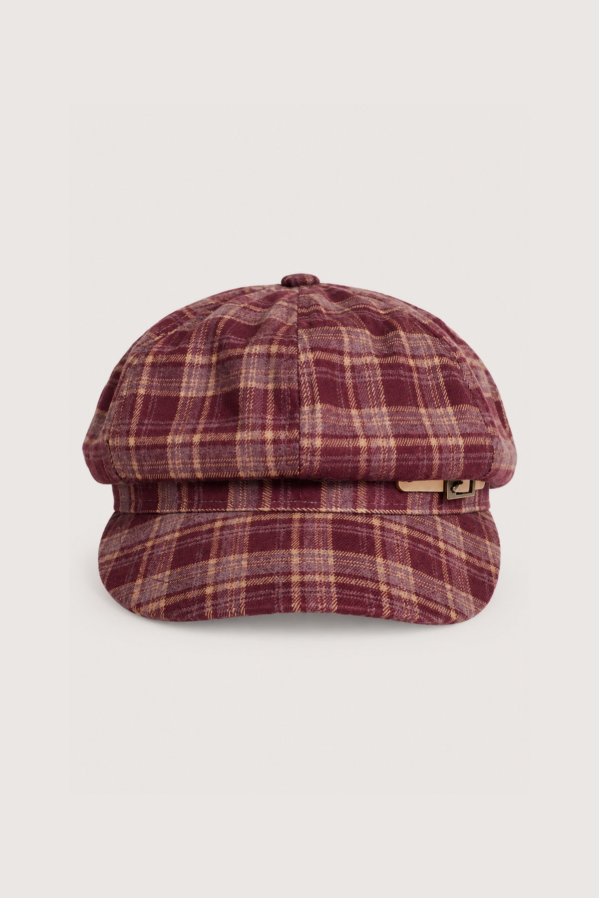 La casquette gavroche à carreaux avec détail boucle