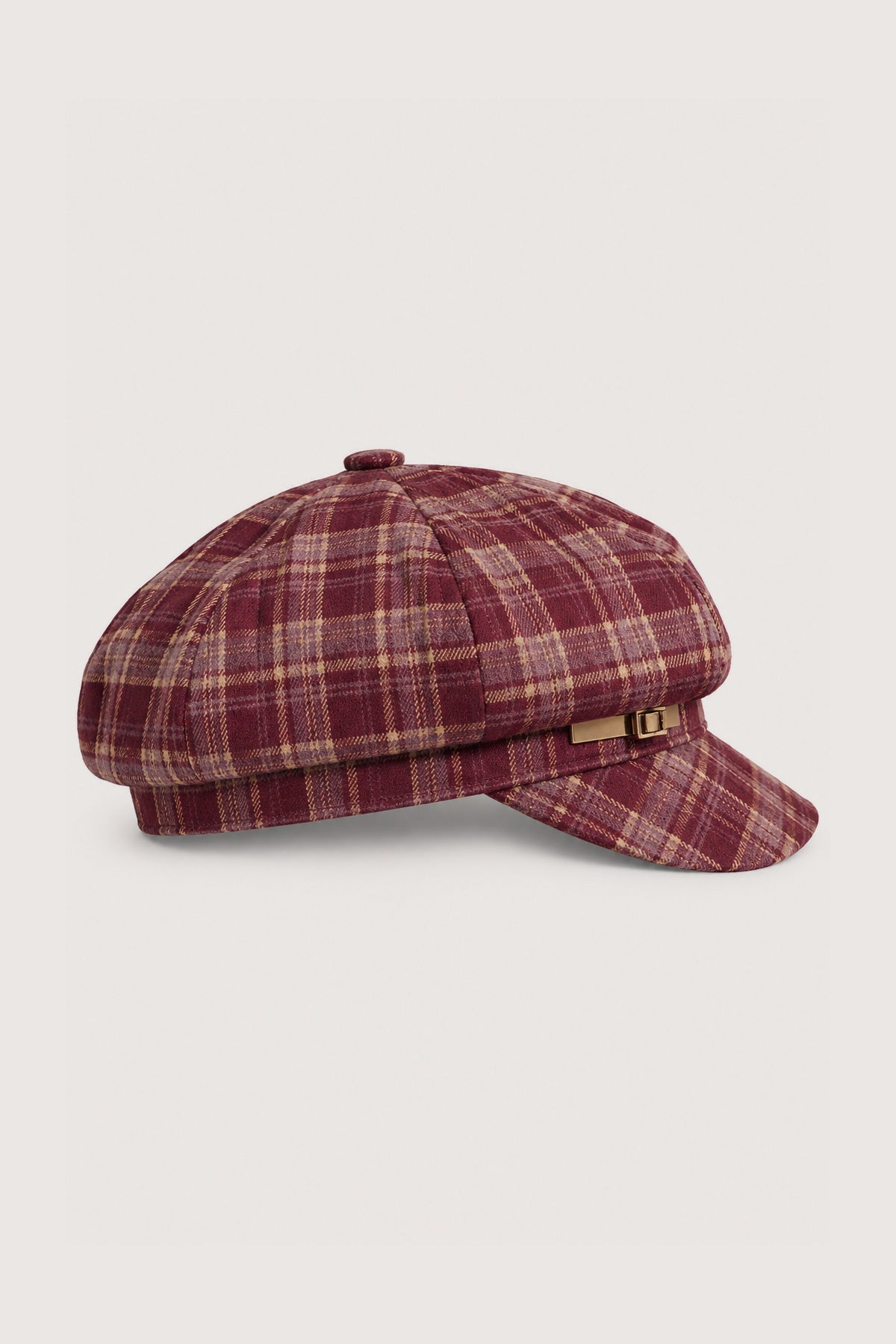 La casquette gavroche à carreaux avec détail boucle