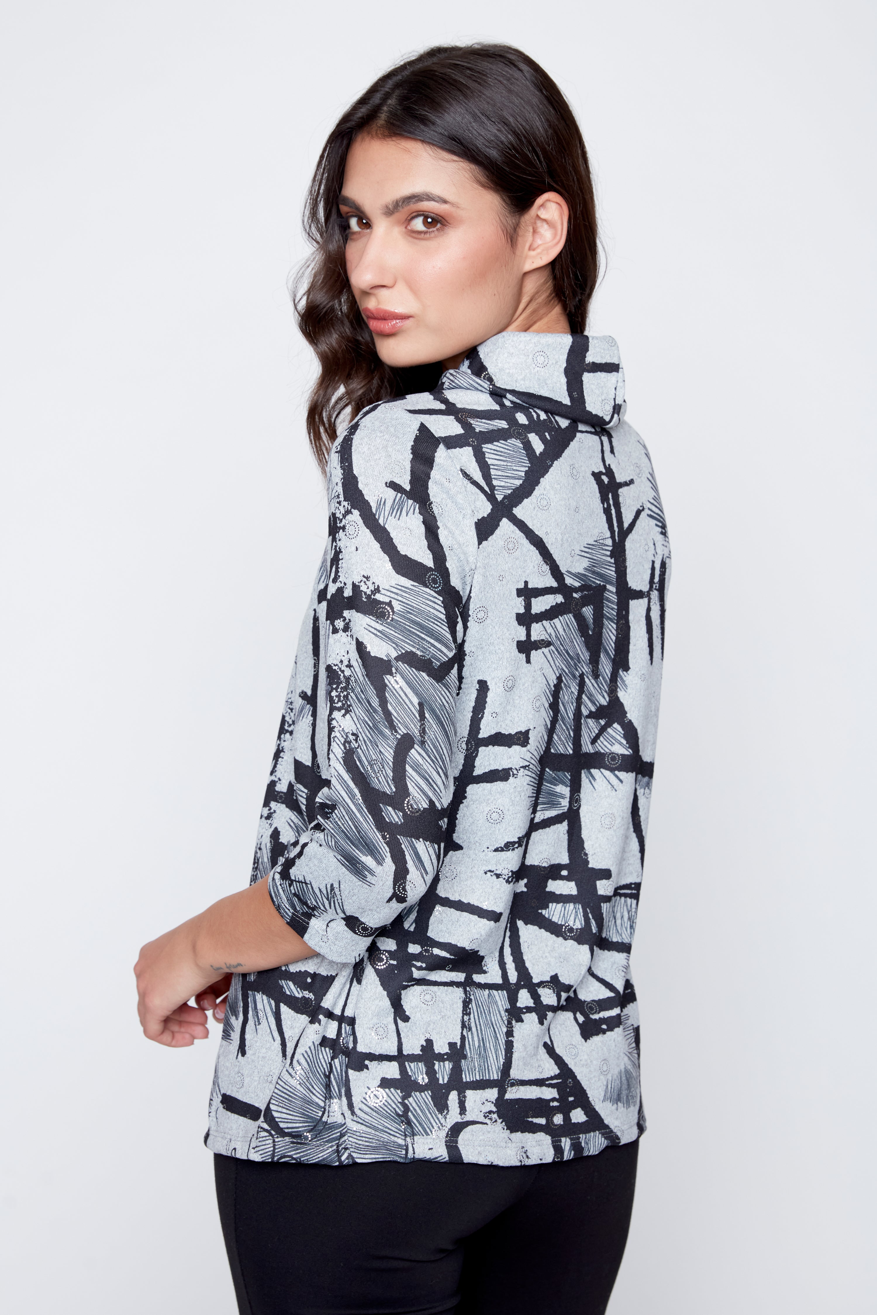 Le pull à col bénitier