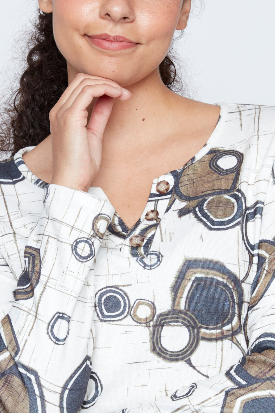 Printed split neck top with button detail