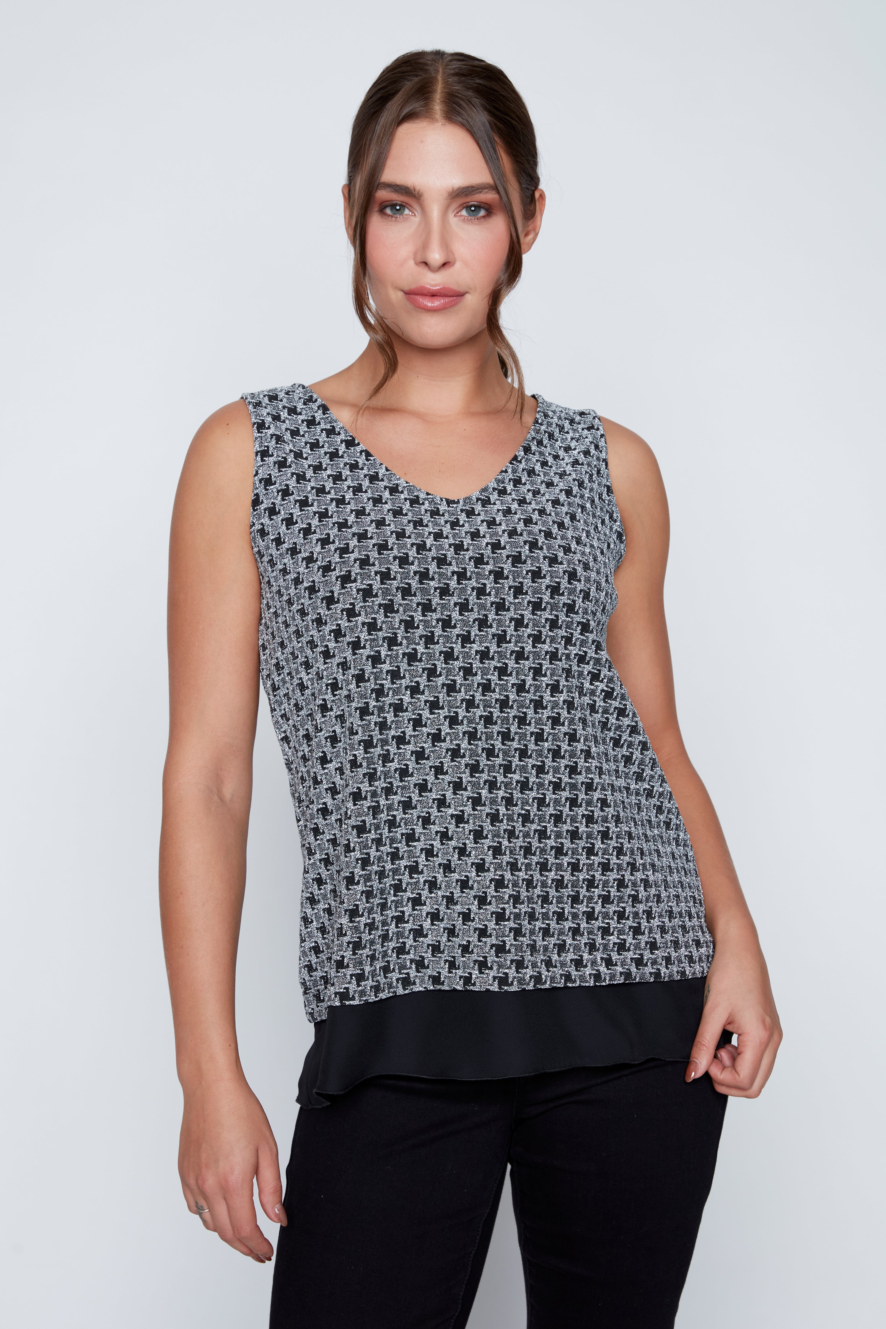 Le haut en lurex à motif pied-de-poule