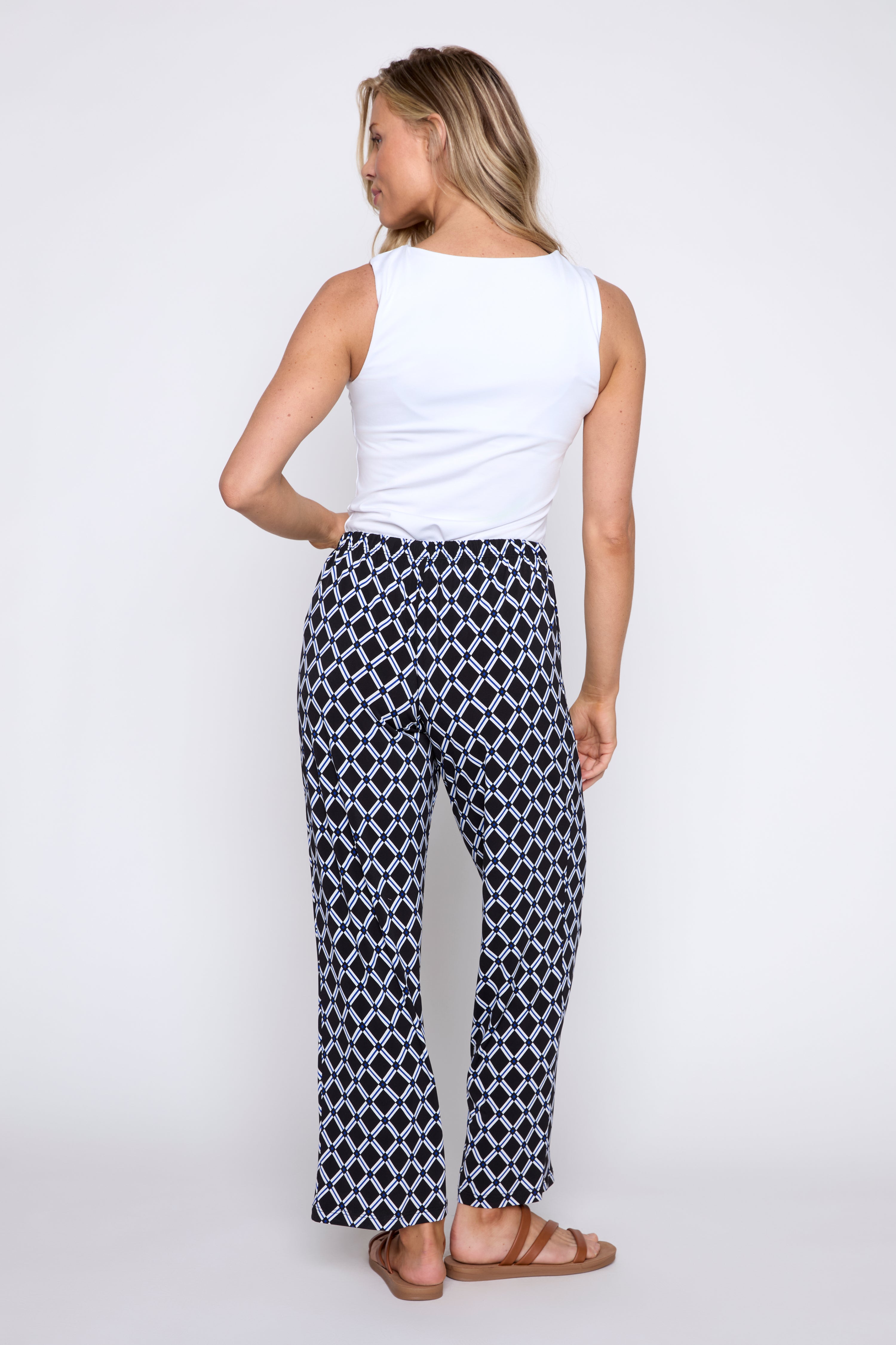 Le pantalon noir à imprimé géométrique royal