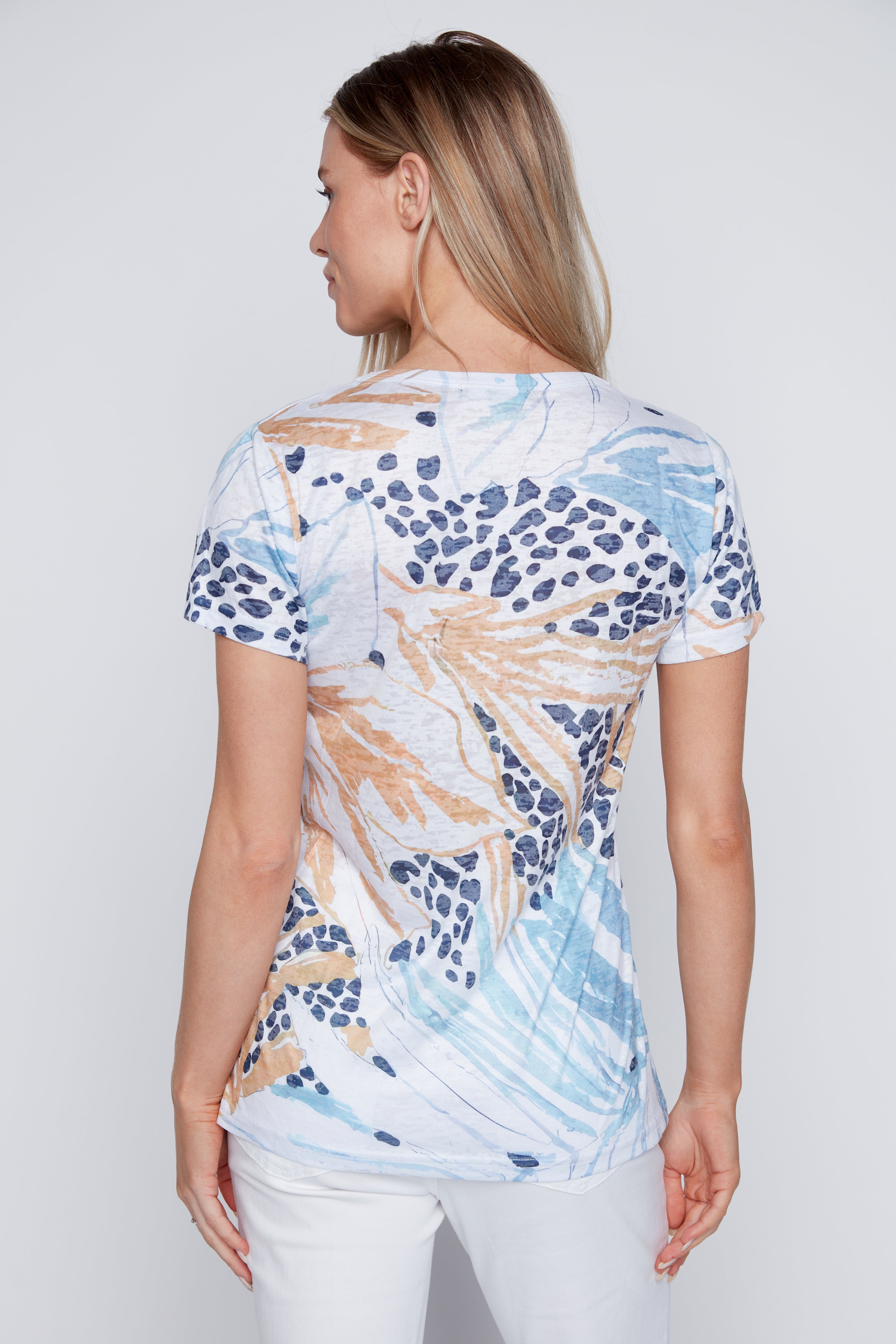 Le t-shirt dévoré à imprimé pois et feuilles