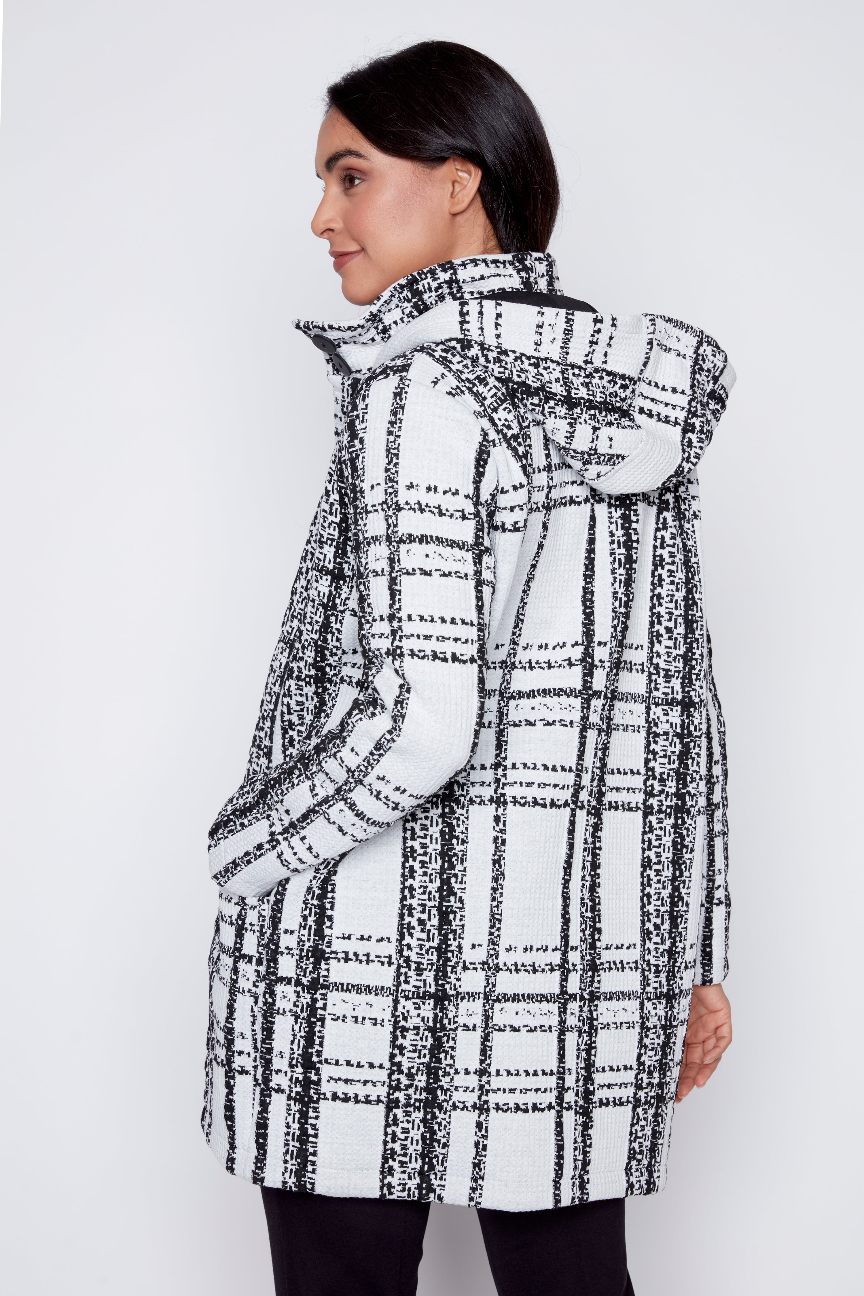 Le manteau à carreaux à capuche