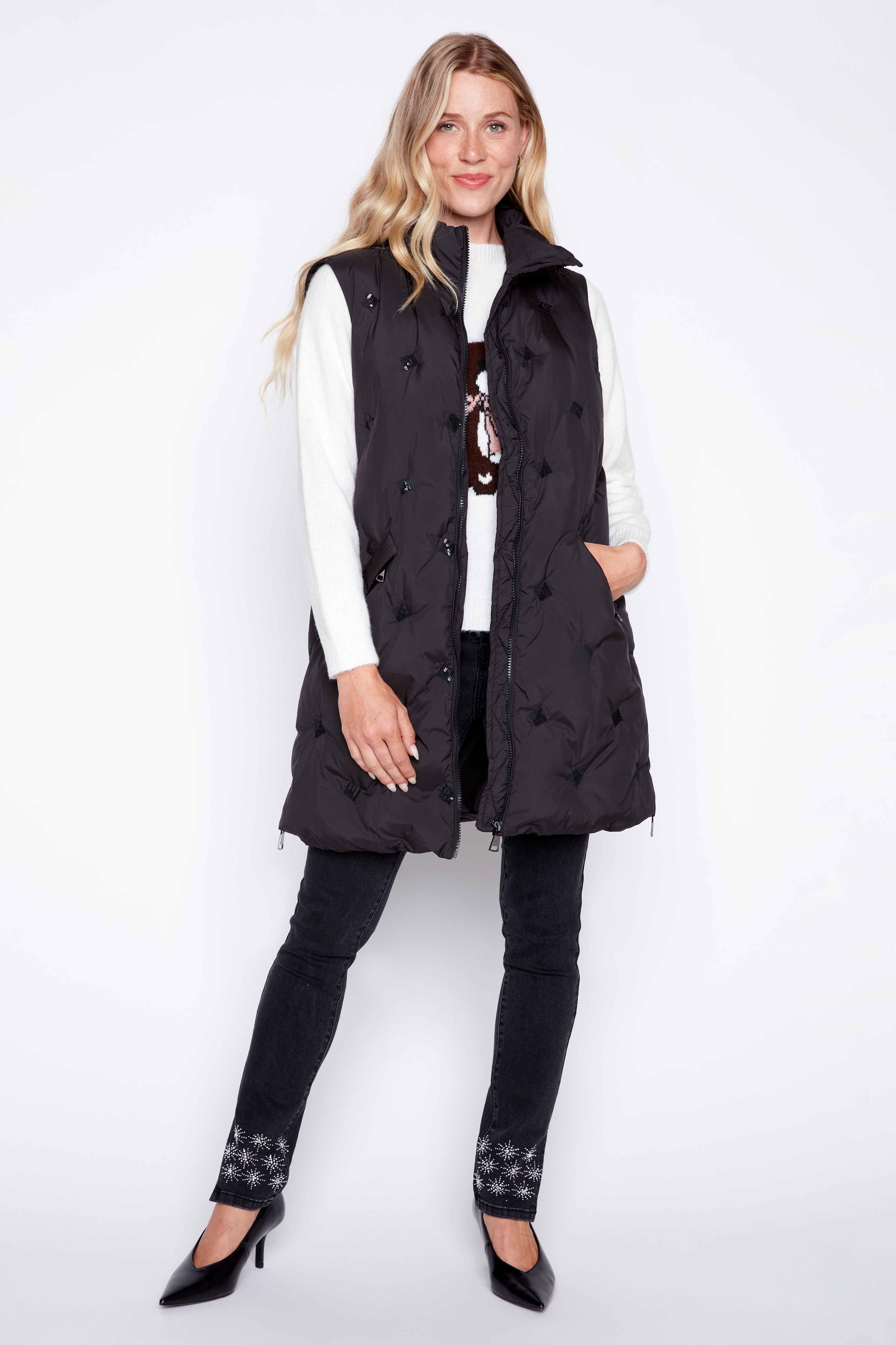 Le gilet matelassé à détails pailletés