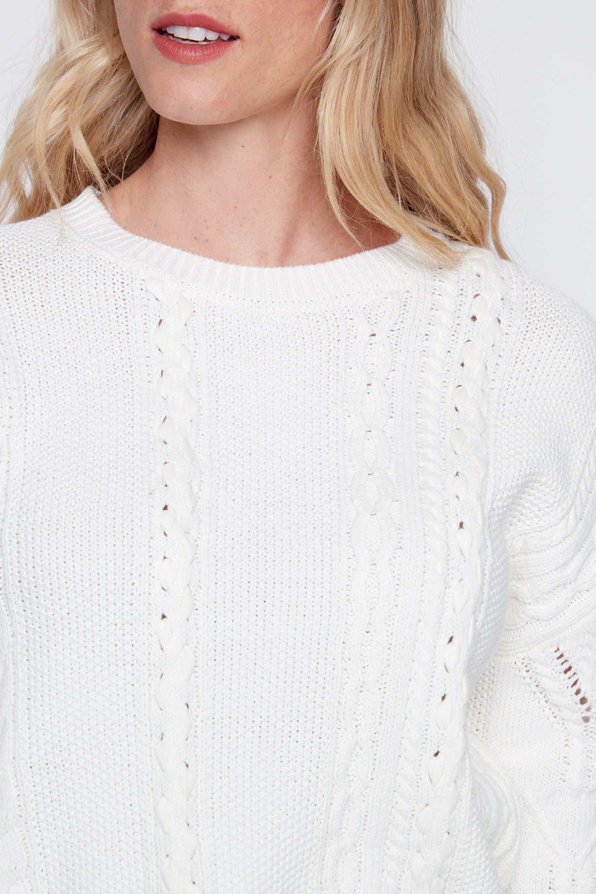 Le pull en maille torsadée
