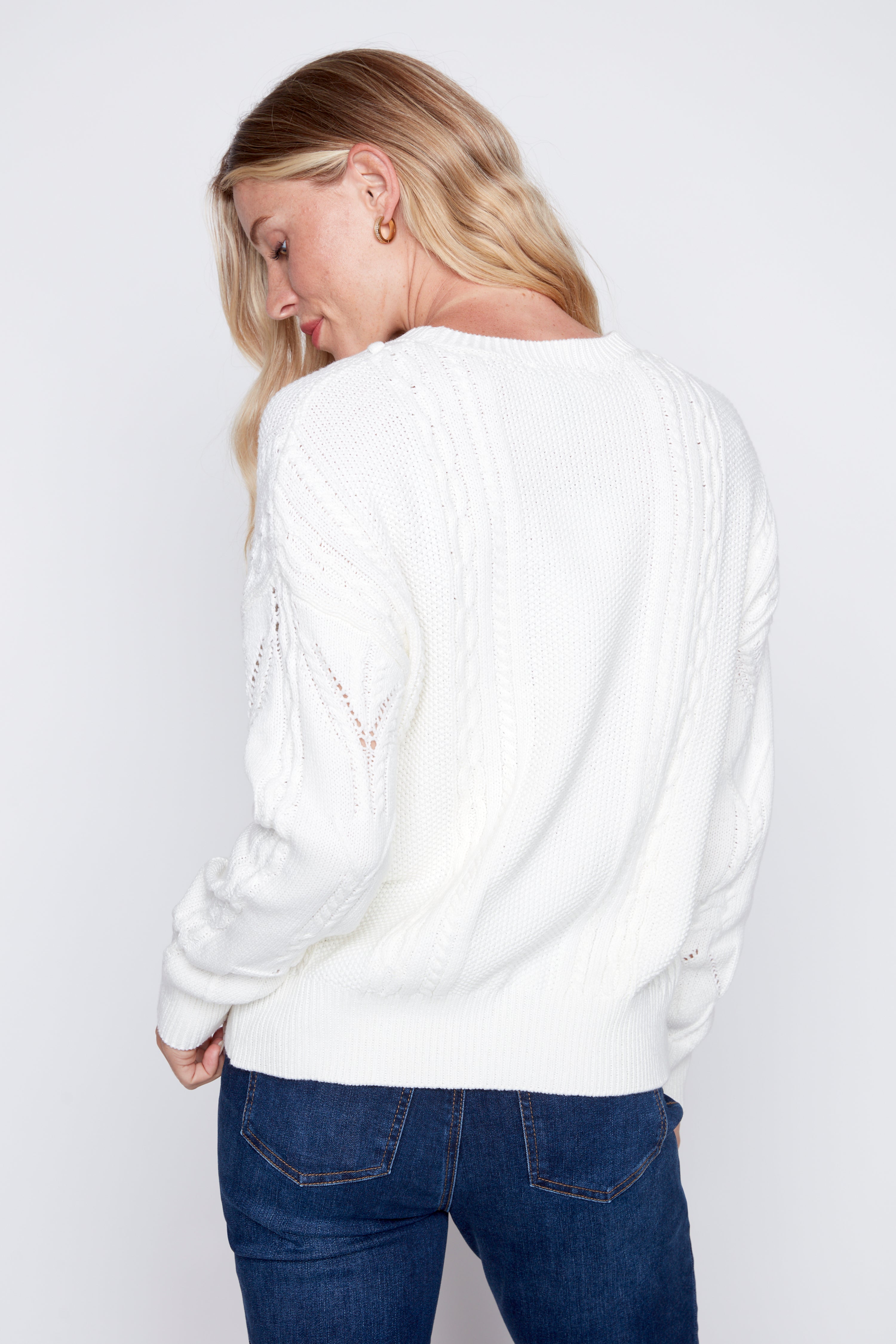 Le pull en maille torsadée
