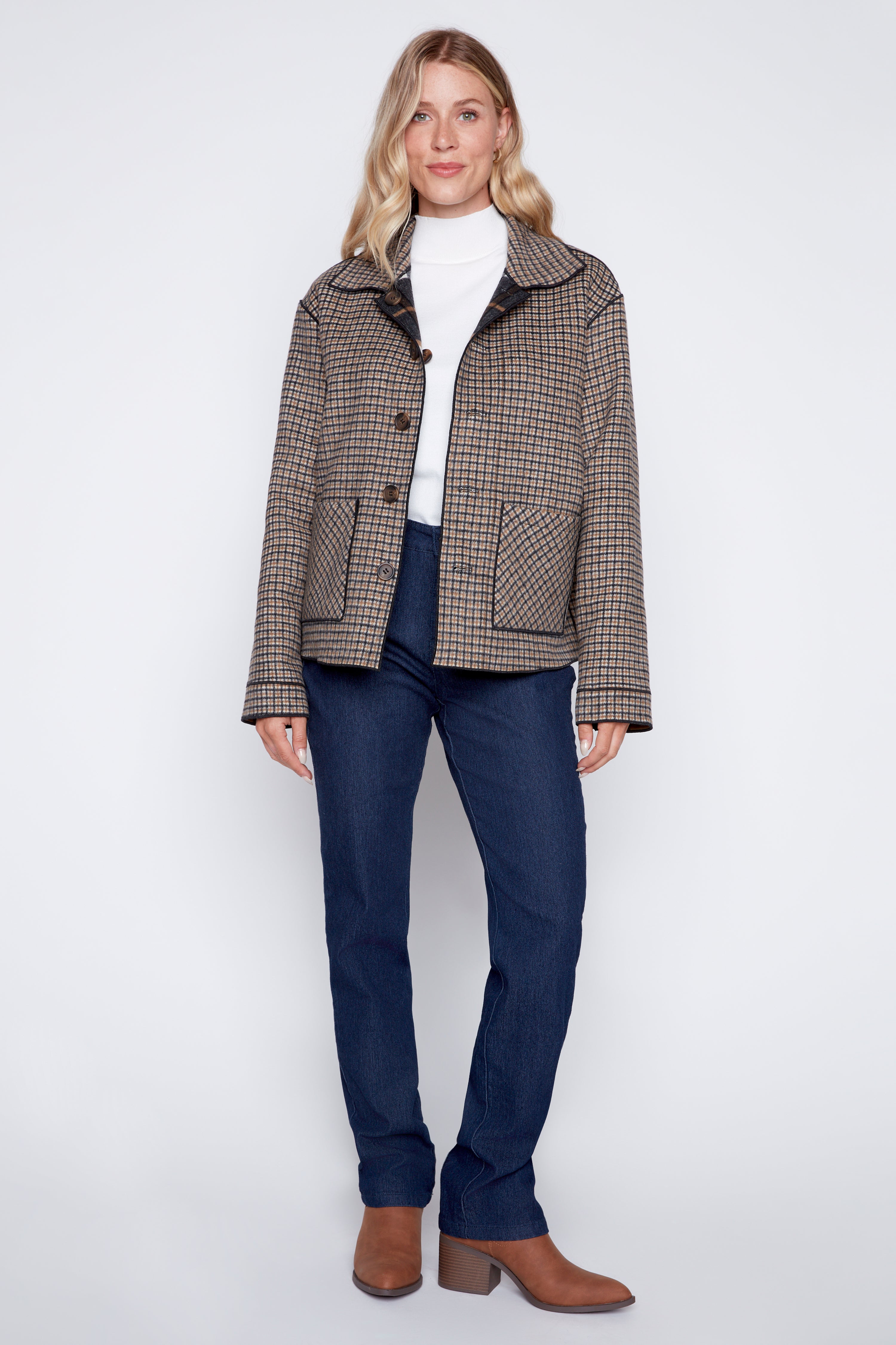 La veste réversible en laine mélangée à carreaux