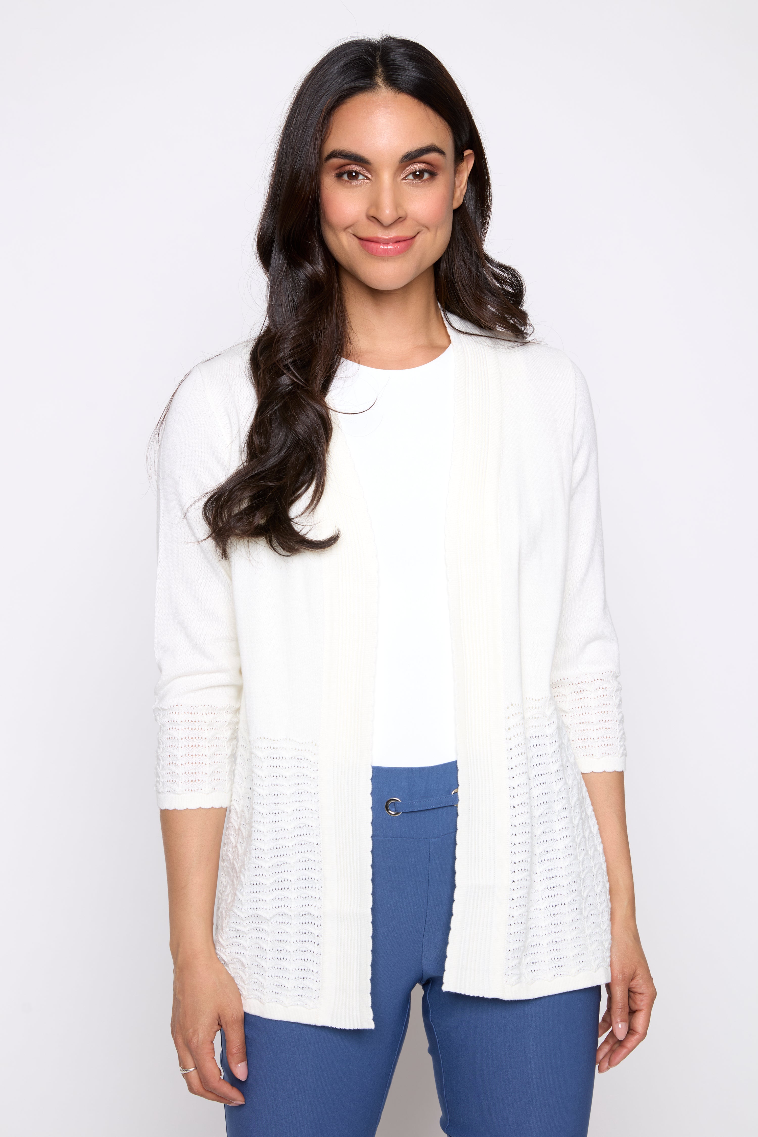 Le cardigan en crochet orné de sequins