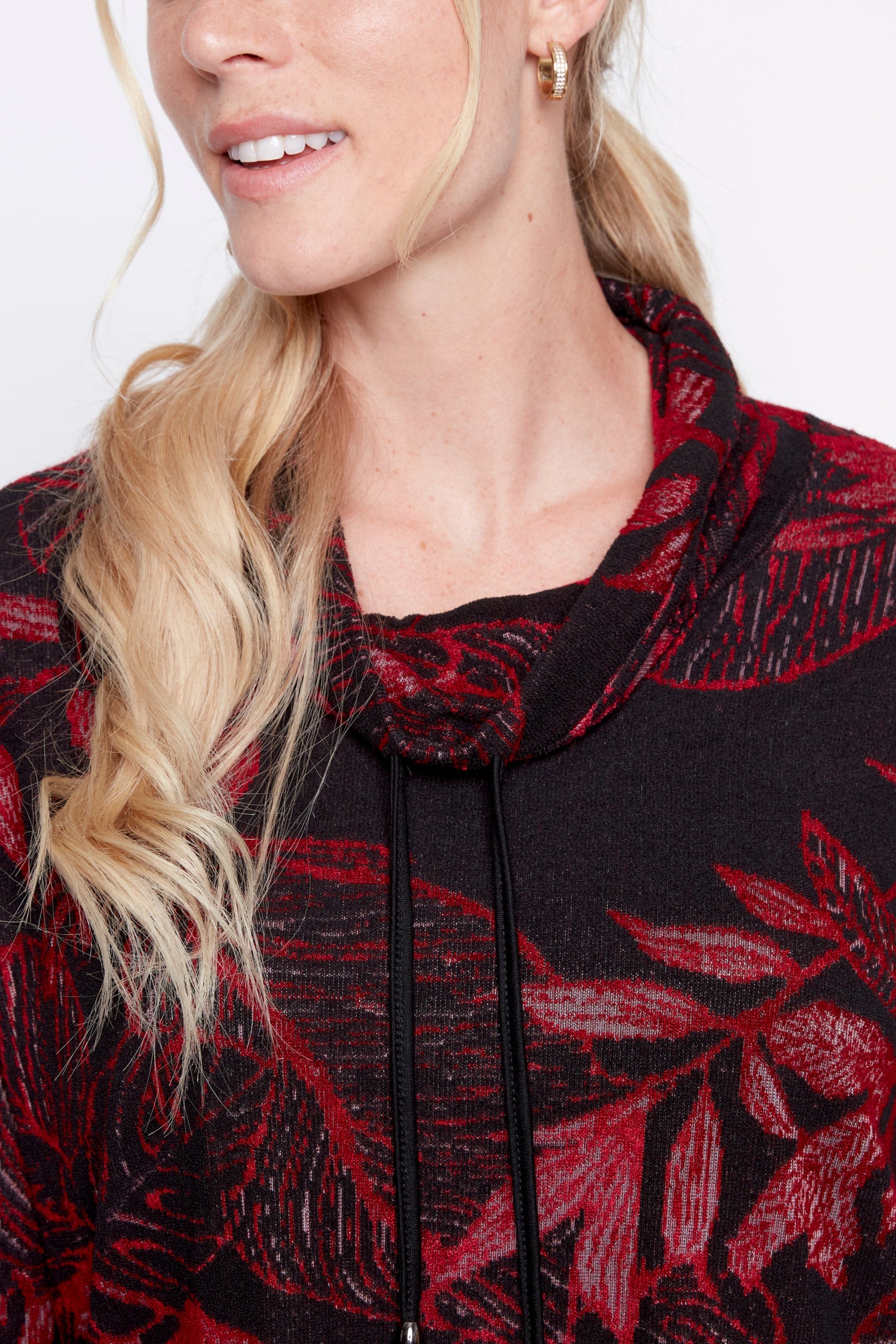 Le haut en maille jacquard fleuri