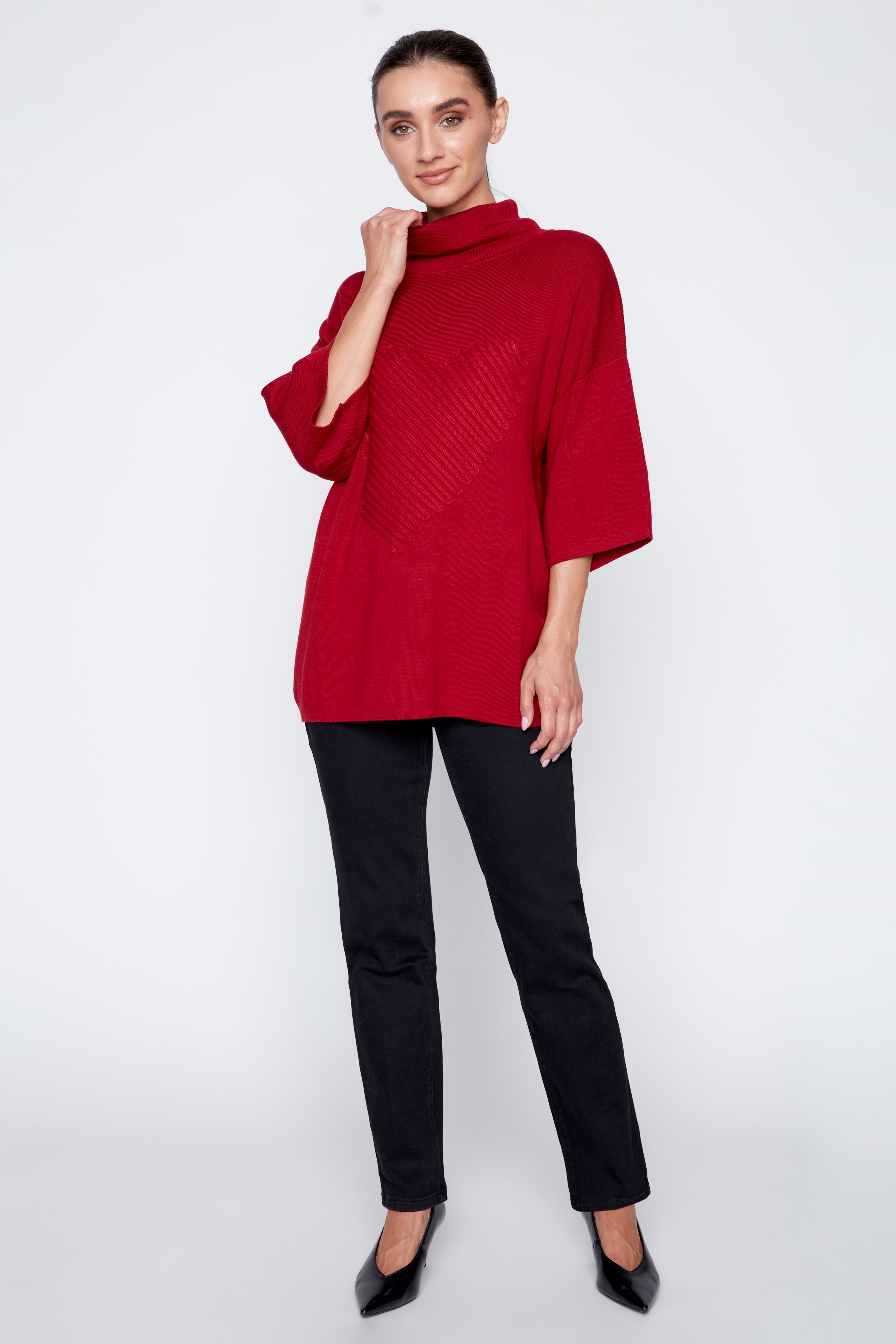 Le pull avec détails de cœur