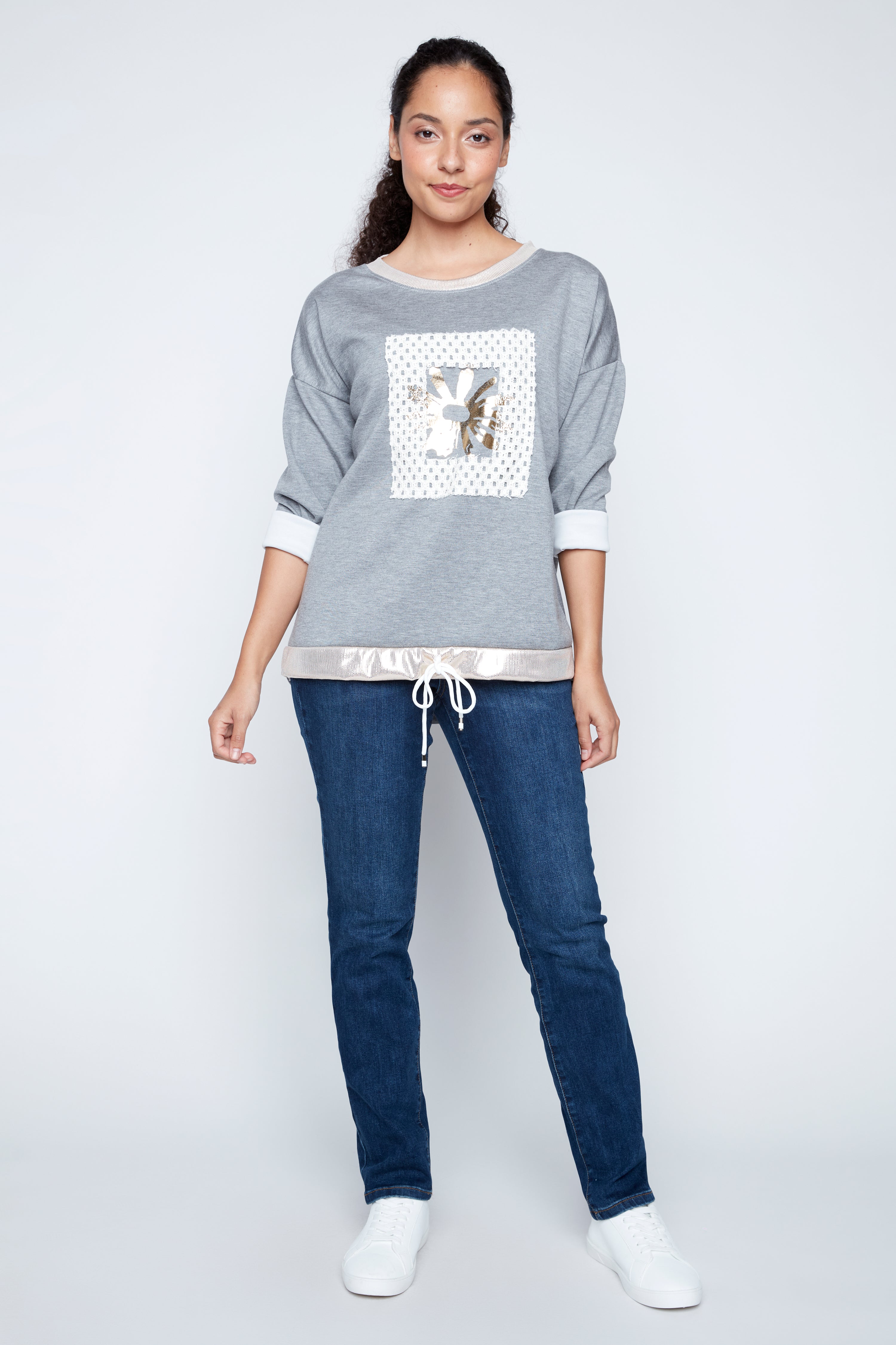 Foil sunflower with crochet applique sweater