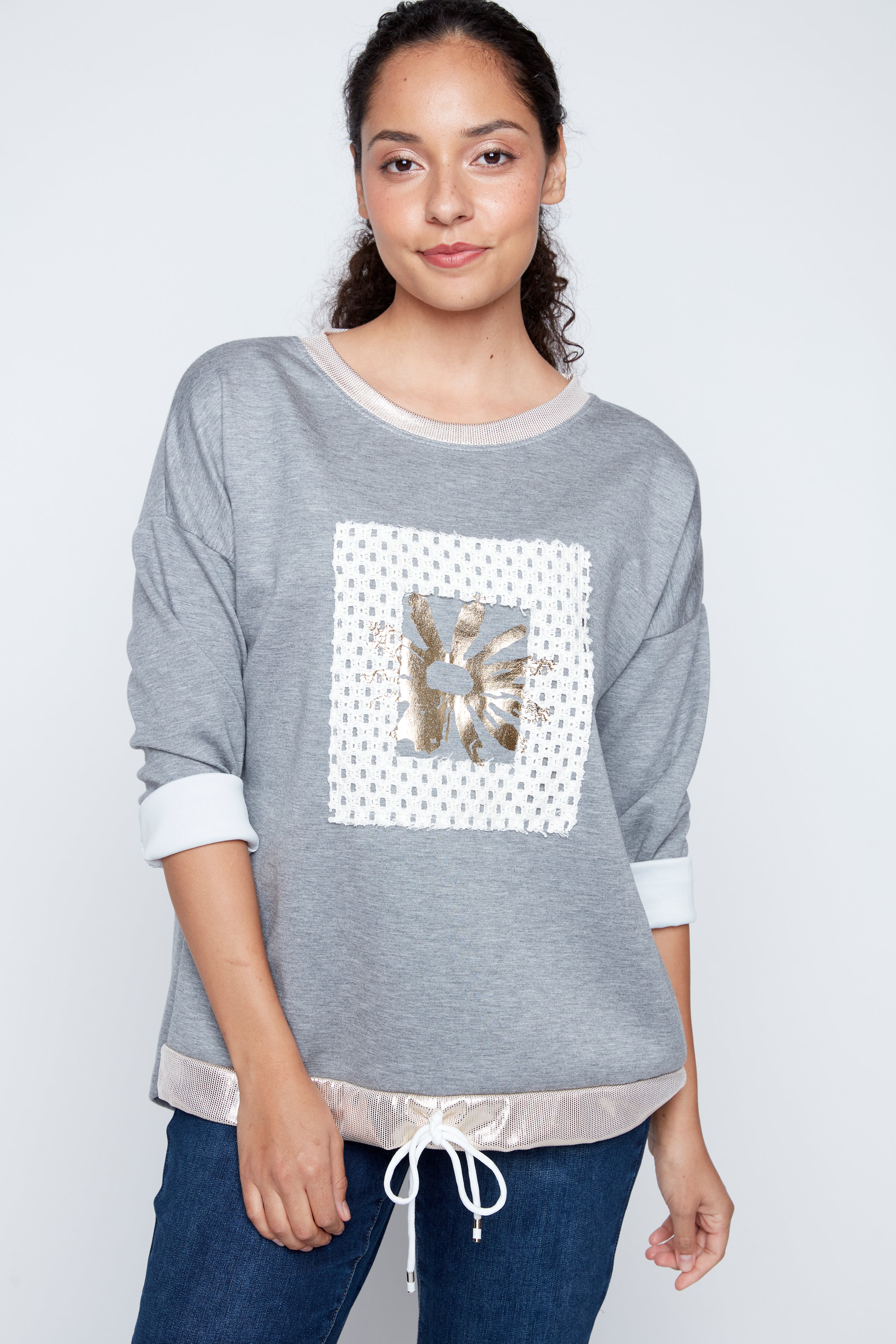 Foil sunflower with crochet applique sweater