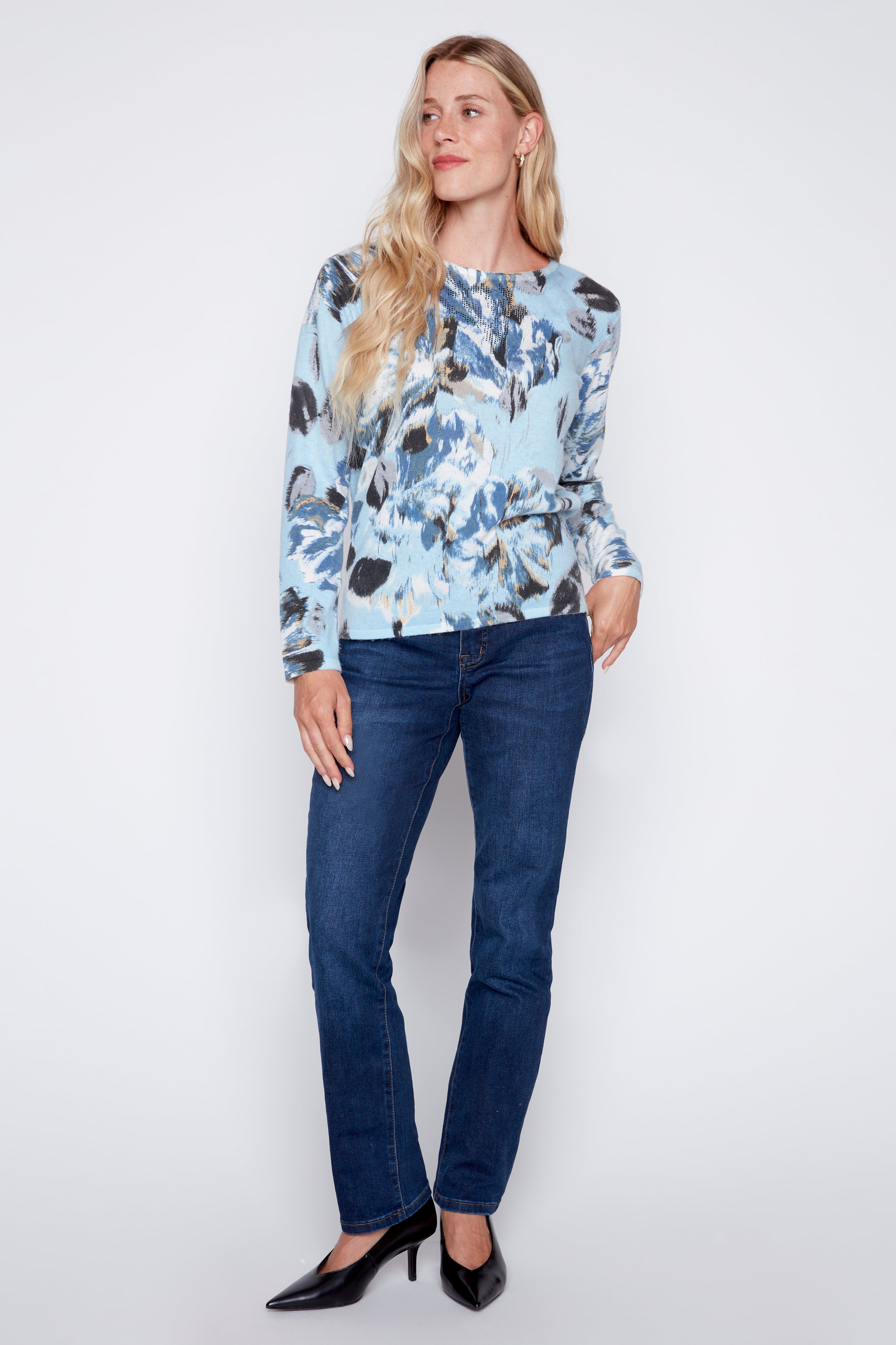 Le pull imprimé abstrait avec paillettes