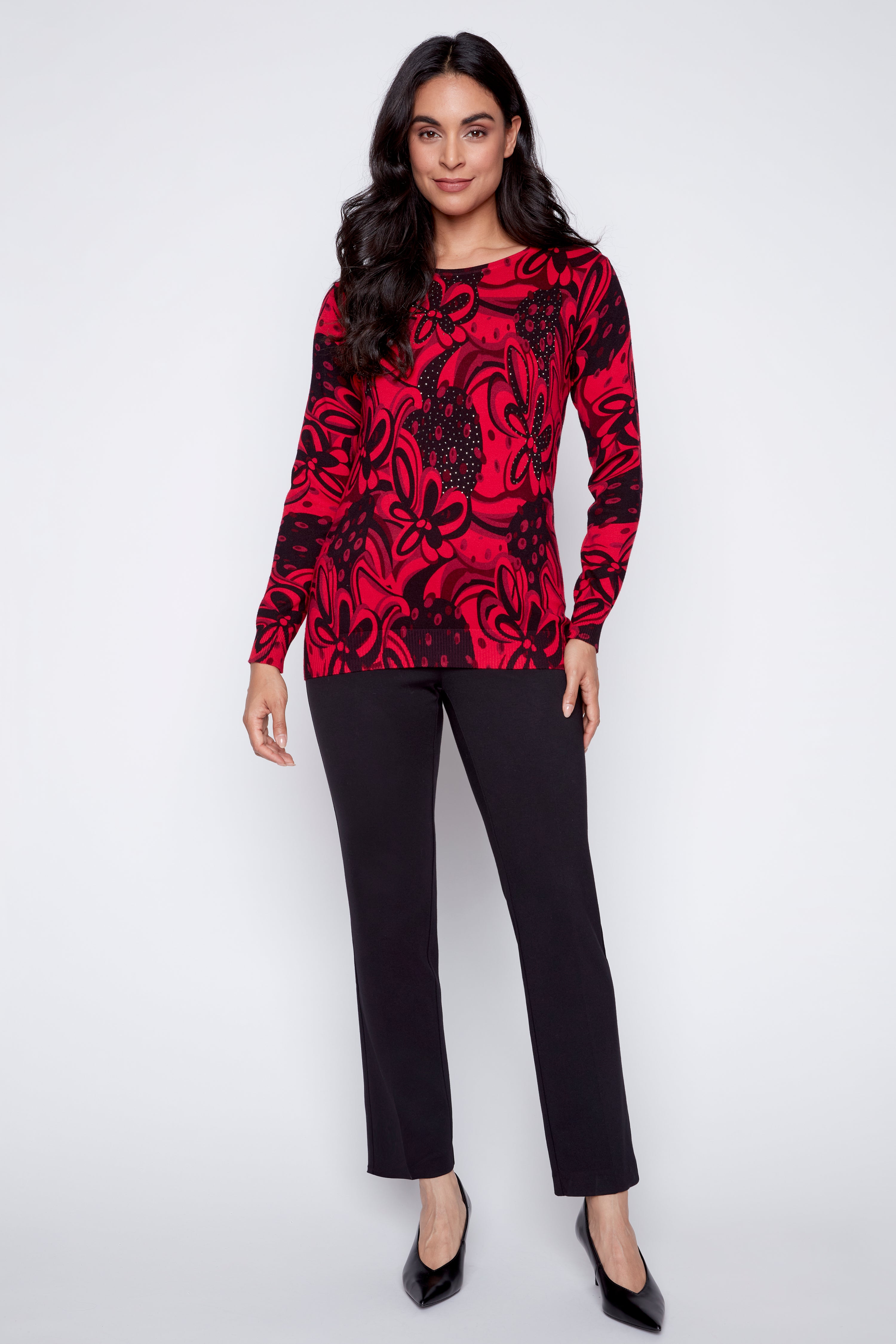 Le pull à motif abstrait avec détails en paillettes