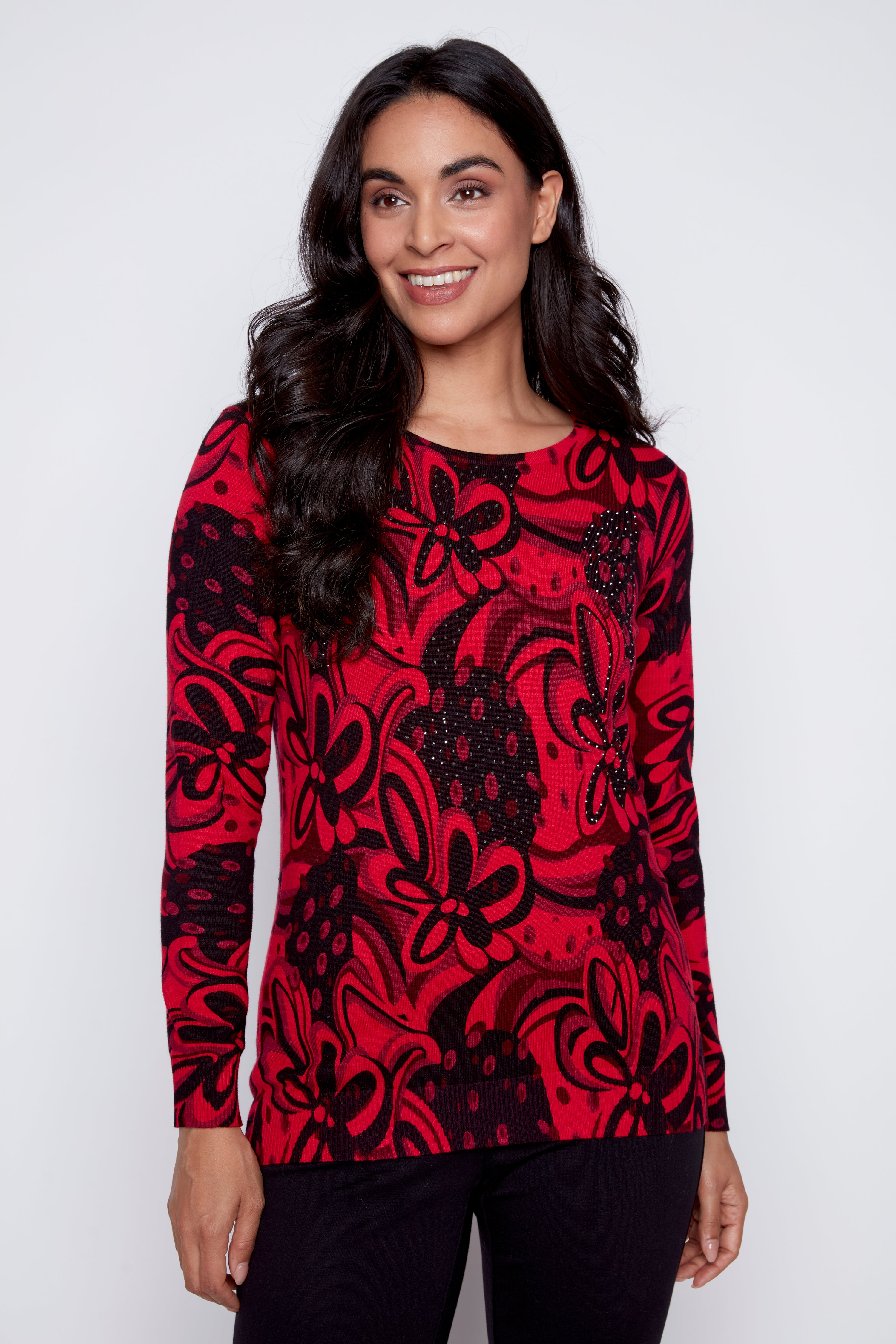 Le pull à motif abstrait avec détails en paillettes