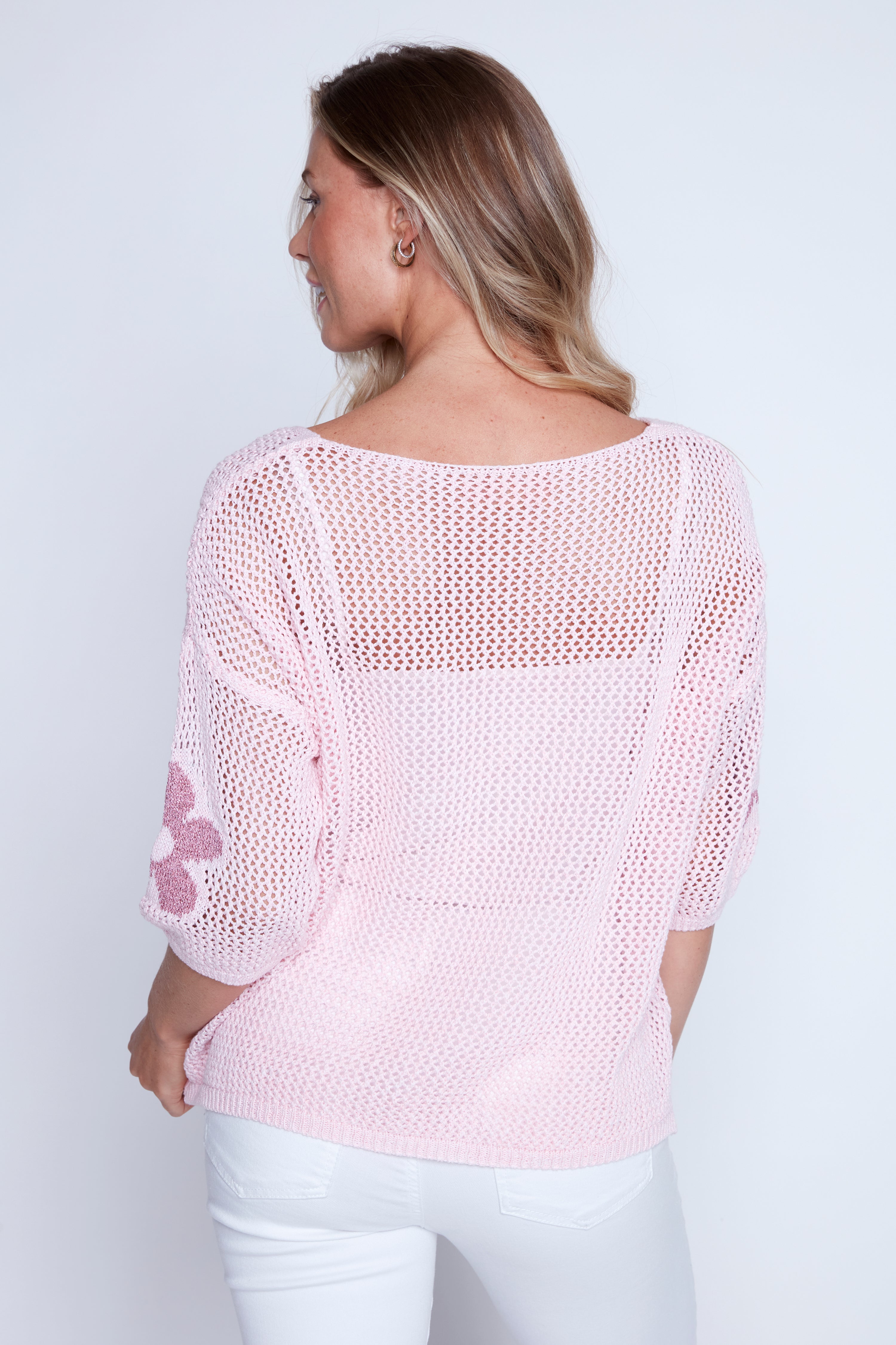 Le pull à imprimé floral rose