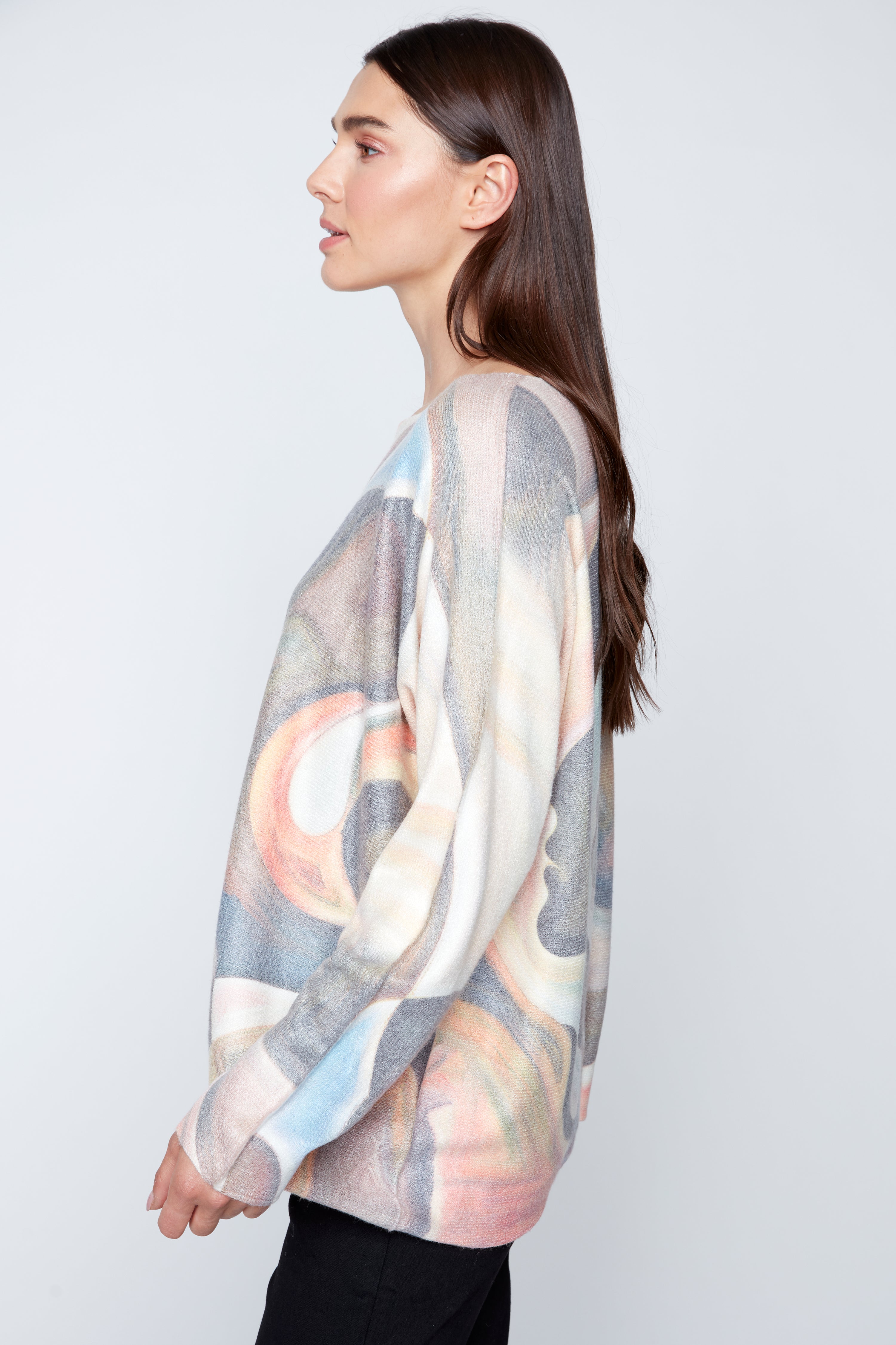 Abstract face print sweater