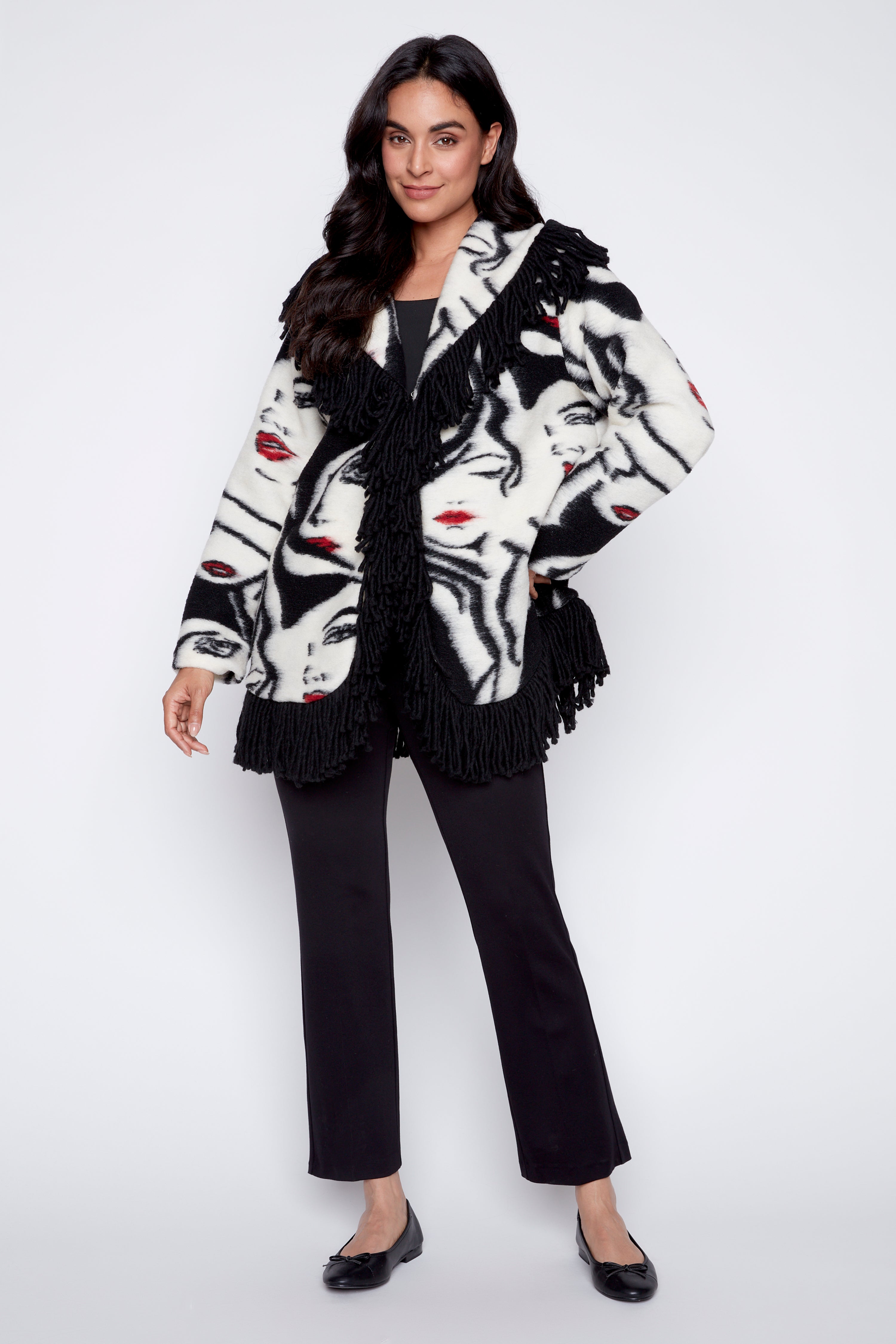 La veste en laine bouillie à imprimé visage et franges