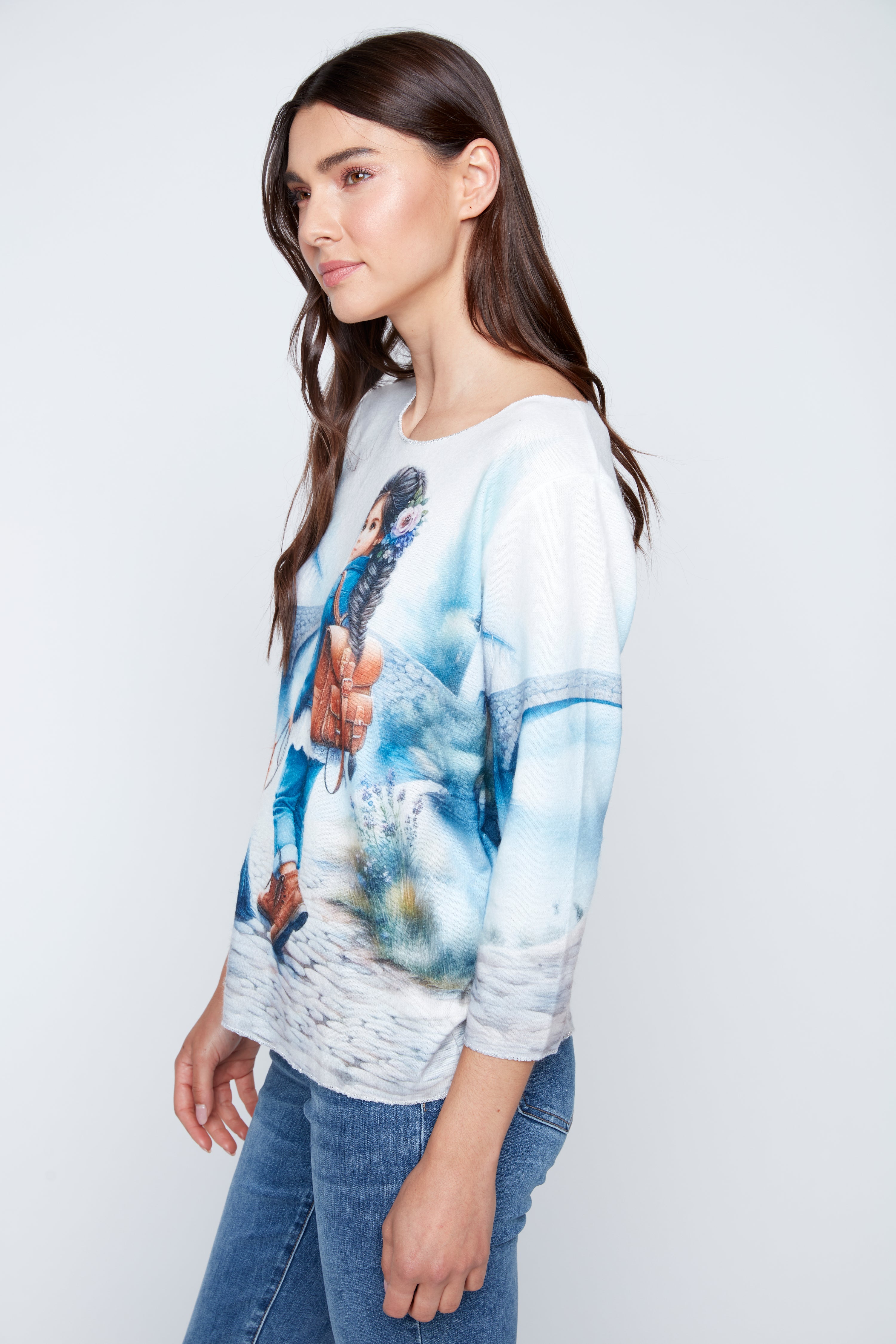 Little girl with dog print knit top
