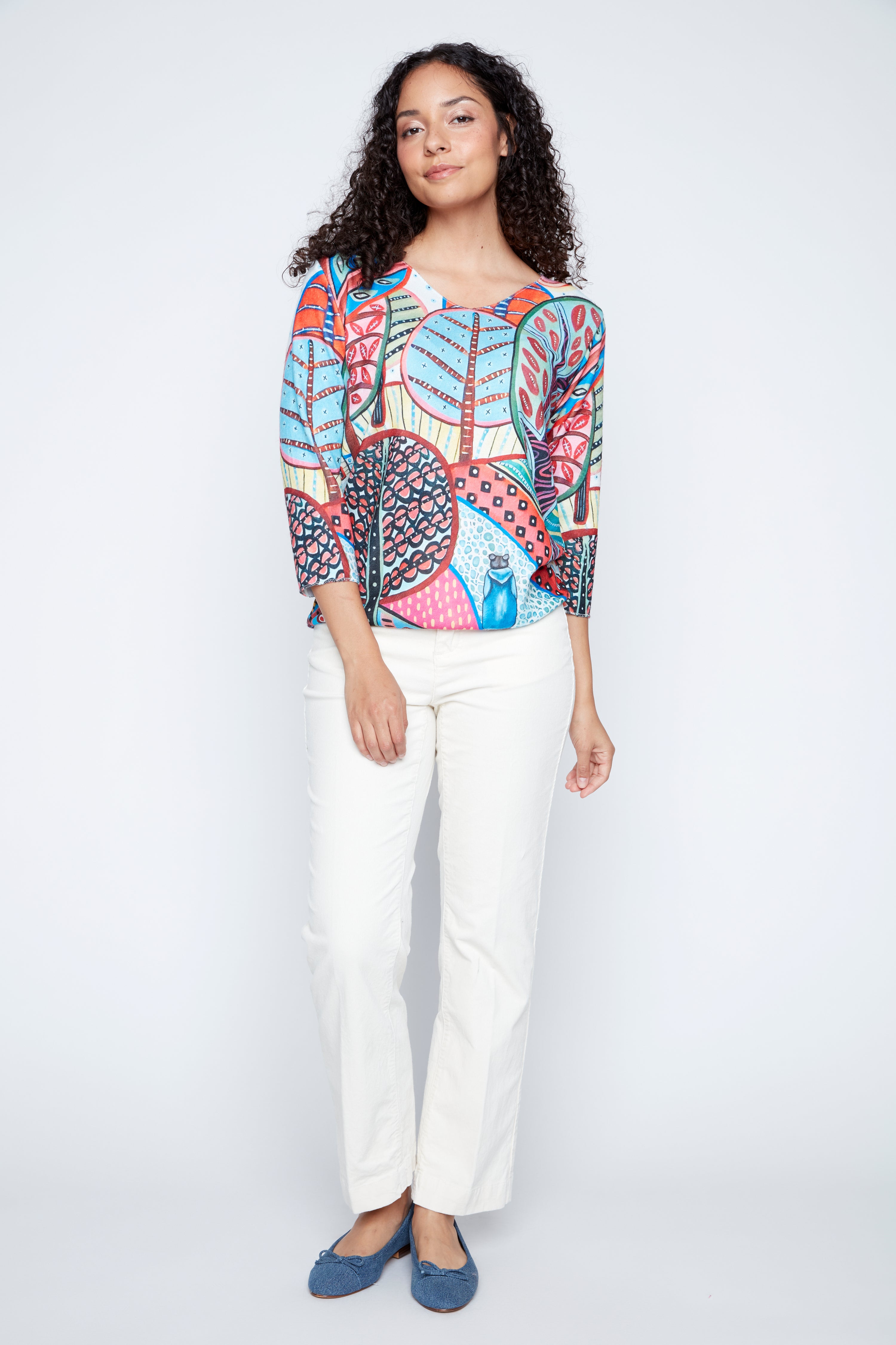 Colorful forest scene print knit sweater