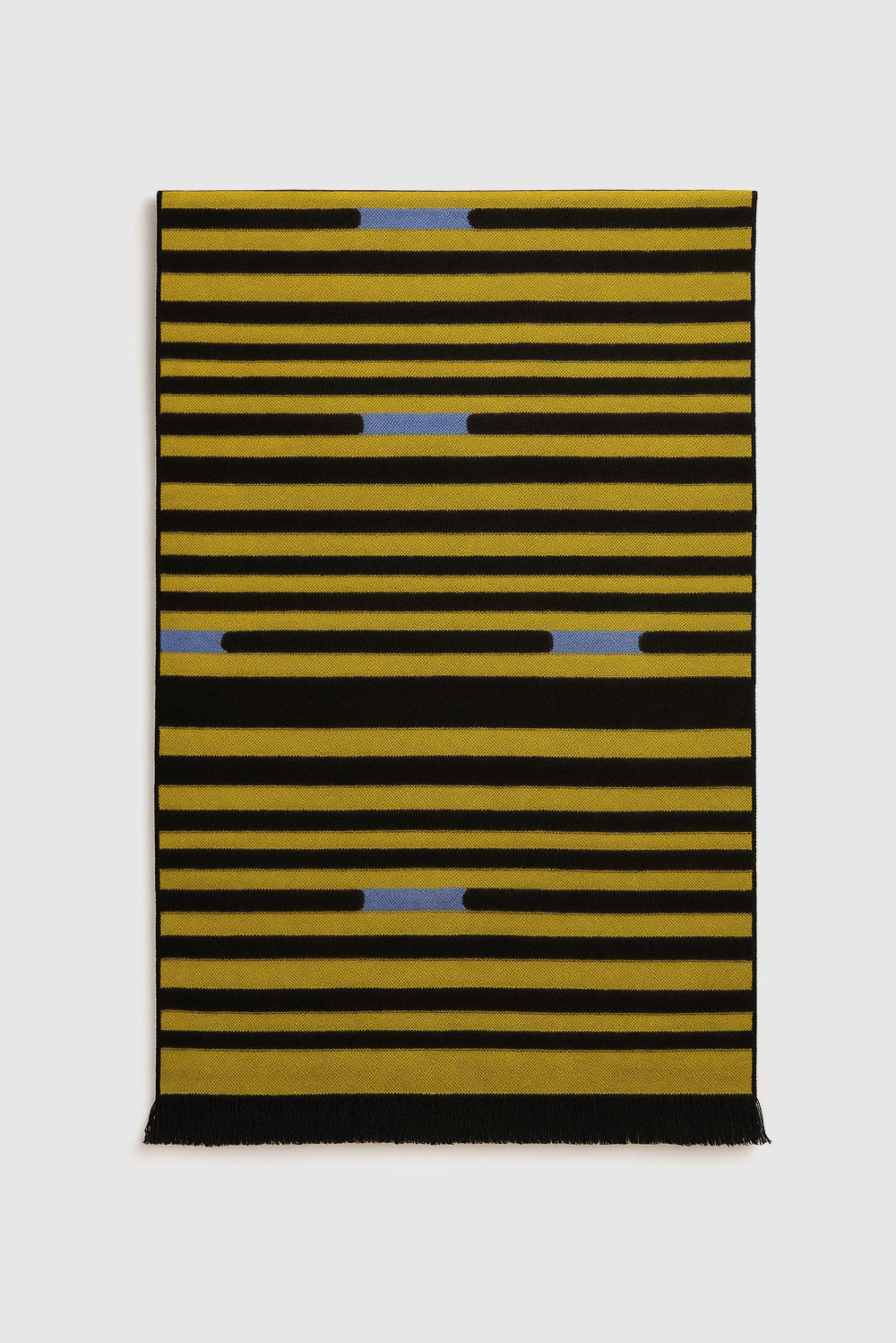 L'écharpe étroite aux lignes abstraites