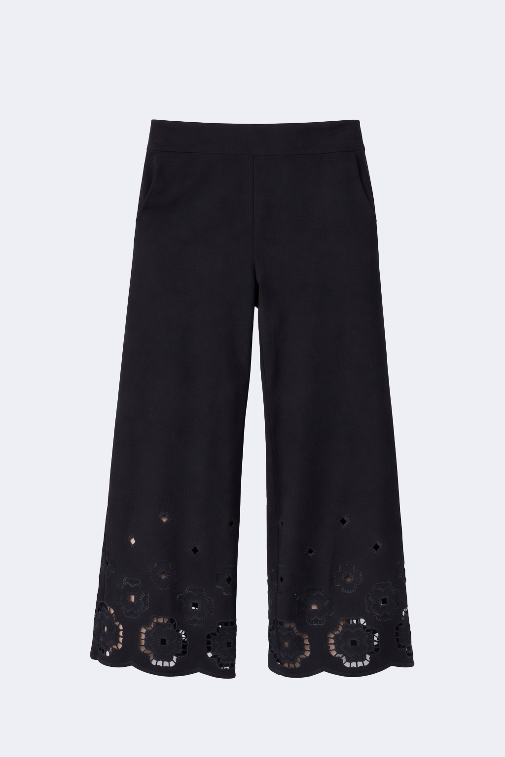 Le capri à jambes larges avec ourlet brodé découpé au laser