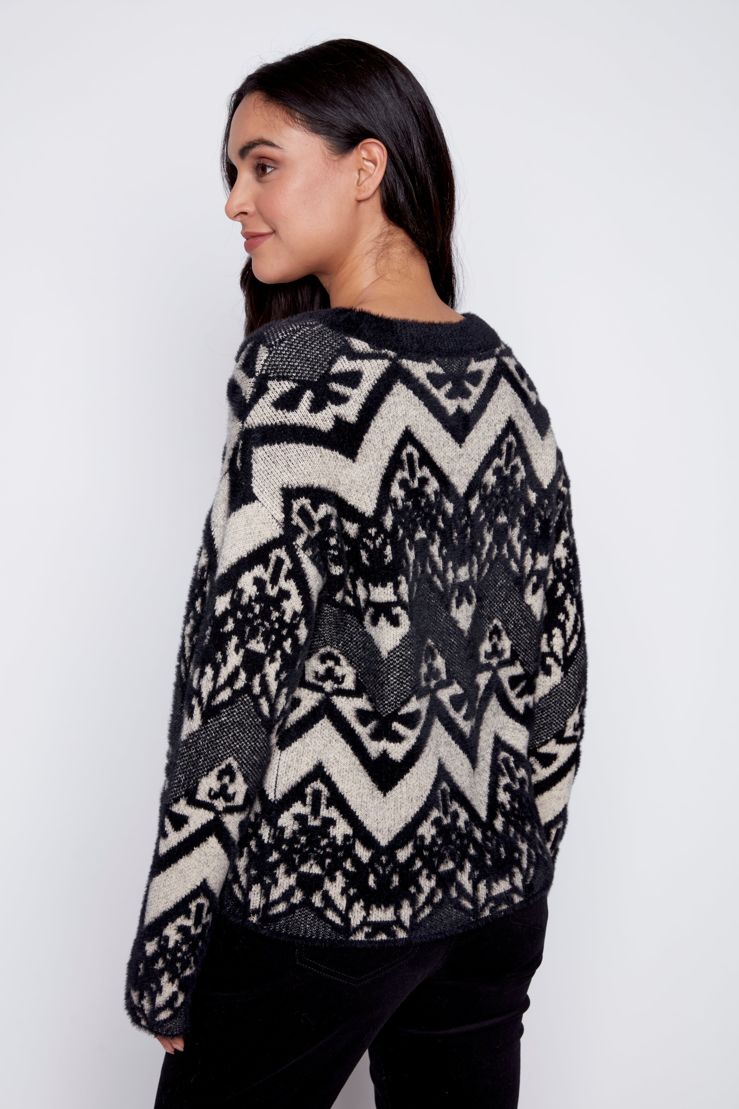 Le pull jacquard à cils