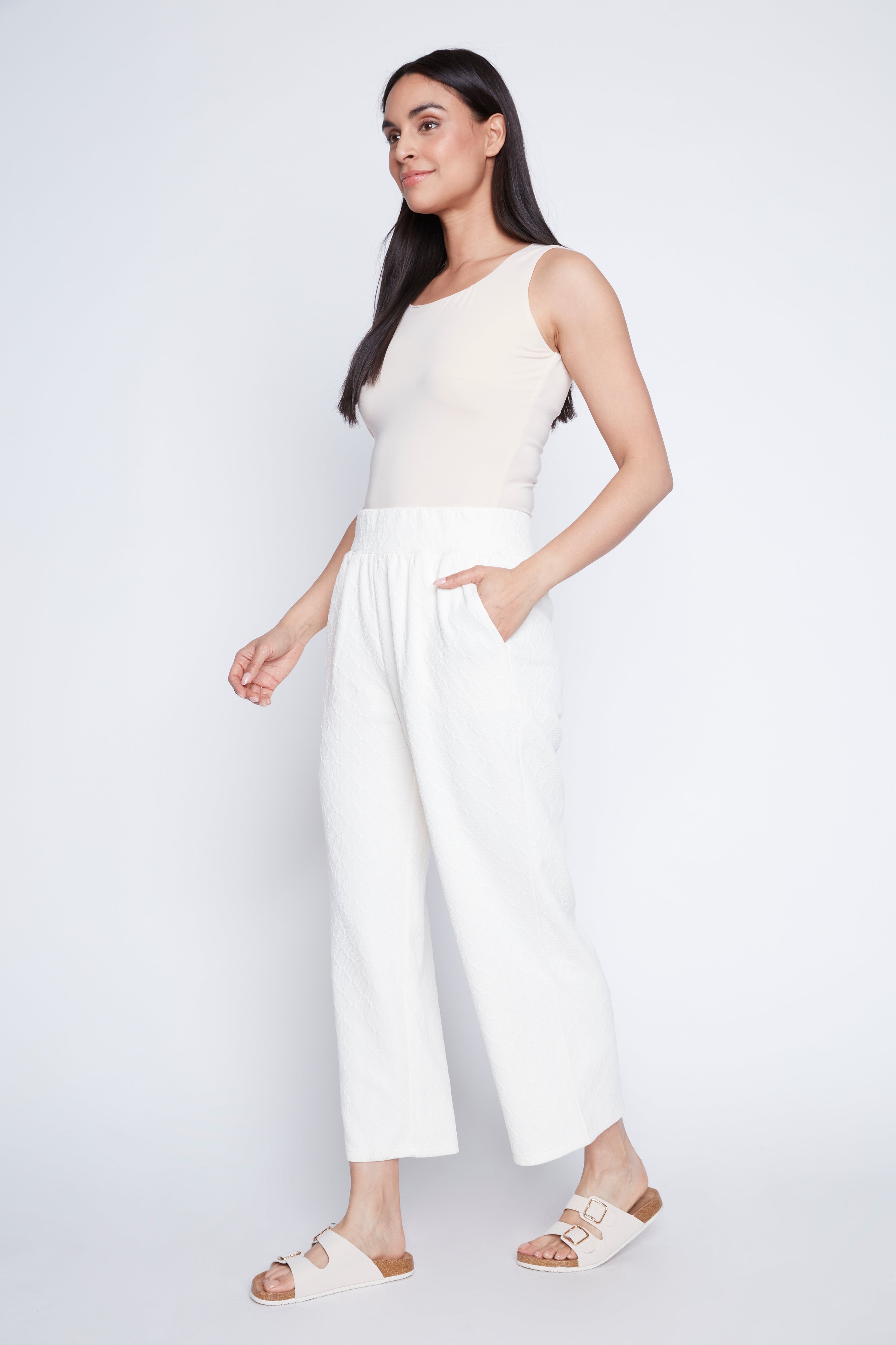 Le pantalon à jambe large en maille losanges