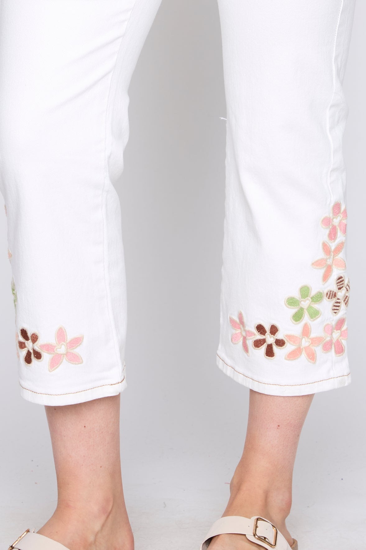 Colored floral embroidery hem jean