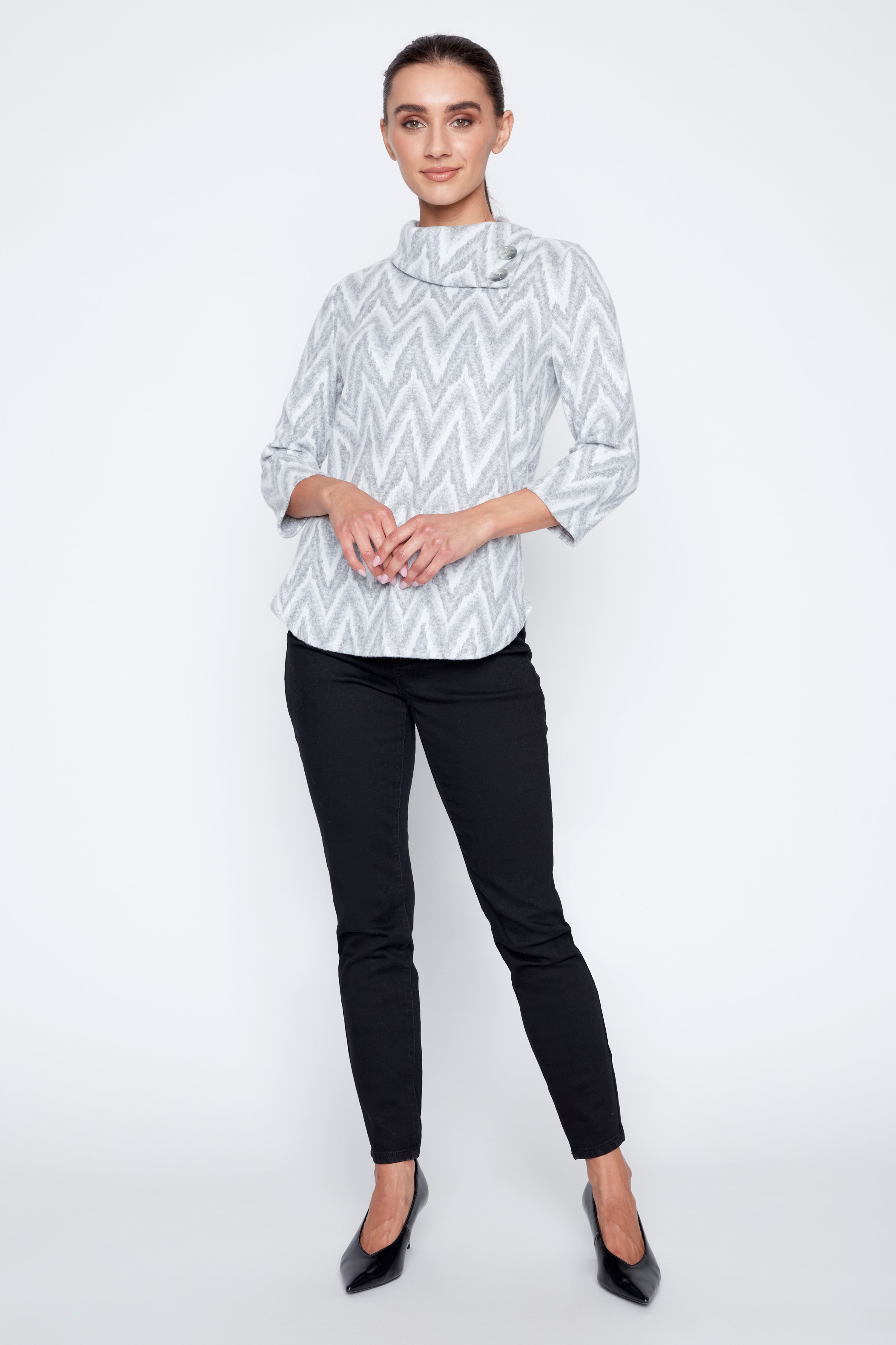 Le haut jacquard à col fendu
