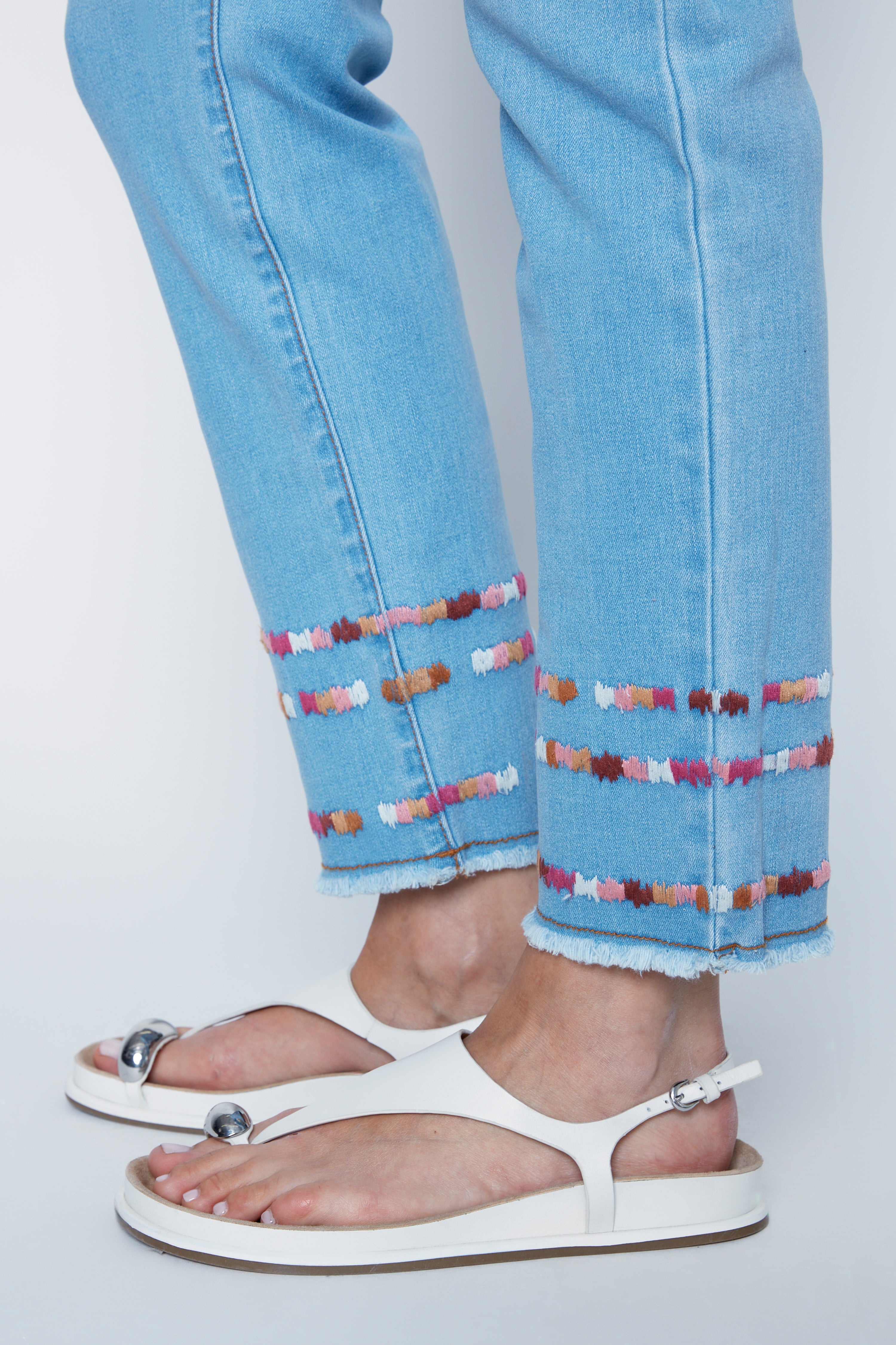 Audrey slim leg embroidered hem jean