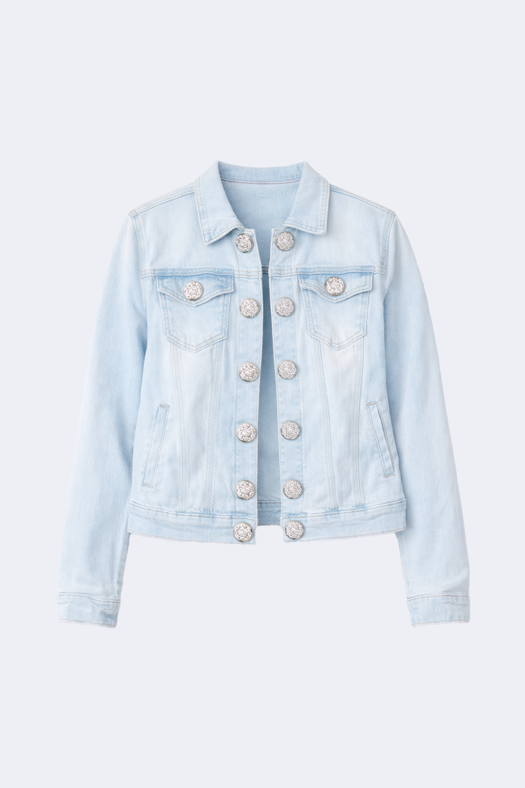 La veste en denim à boutons dorés