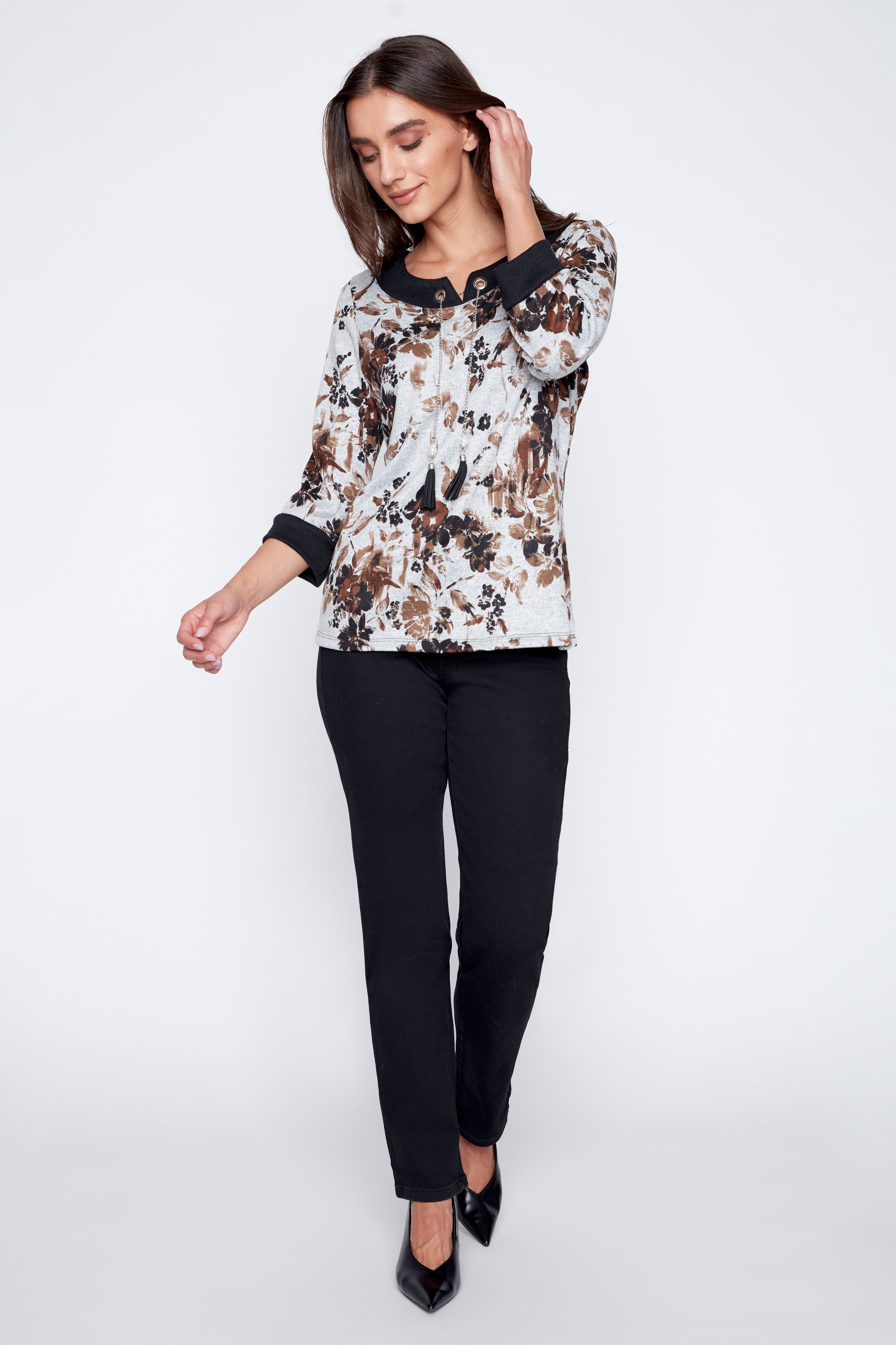 Floral print top with grommet detail