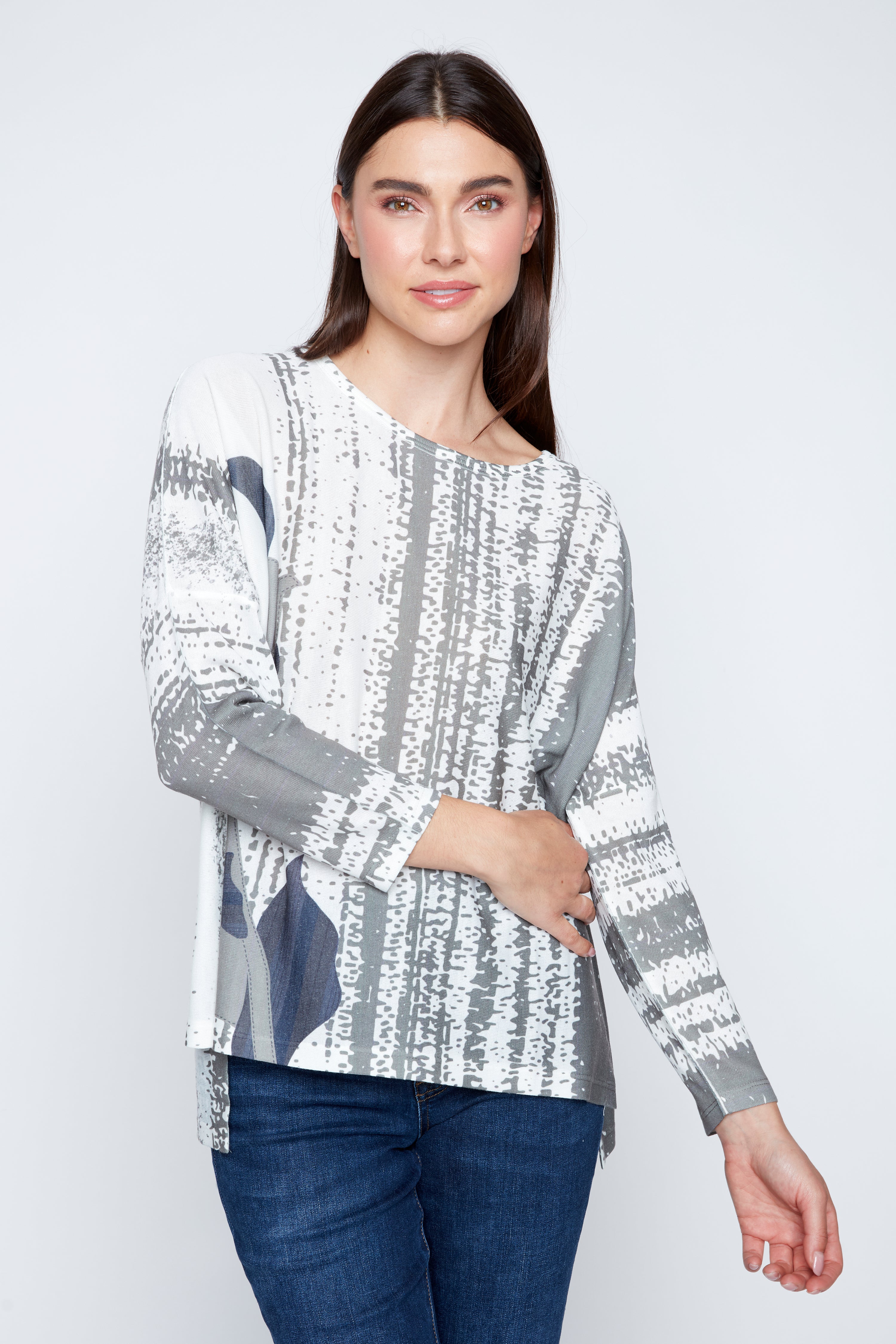 Artistic stripe and leaf pattern top