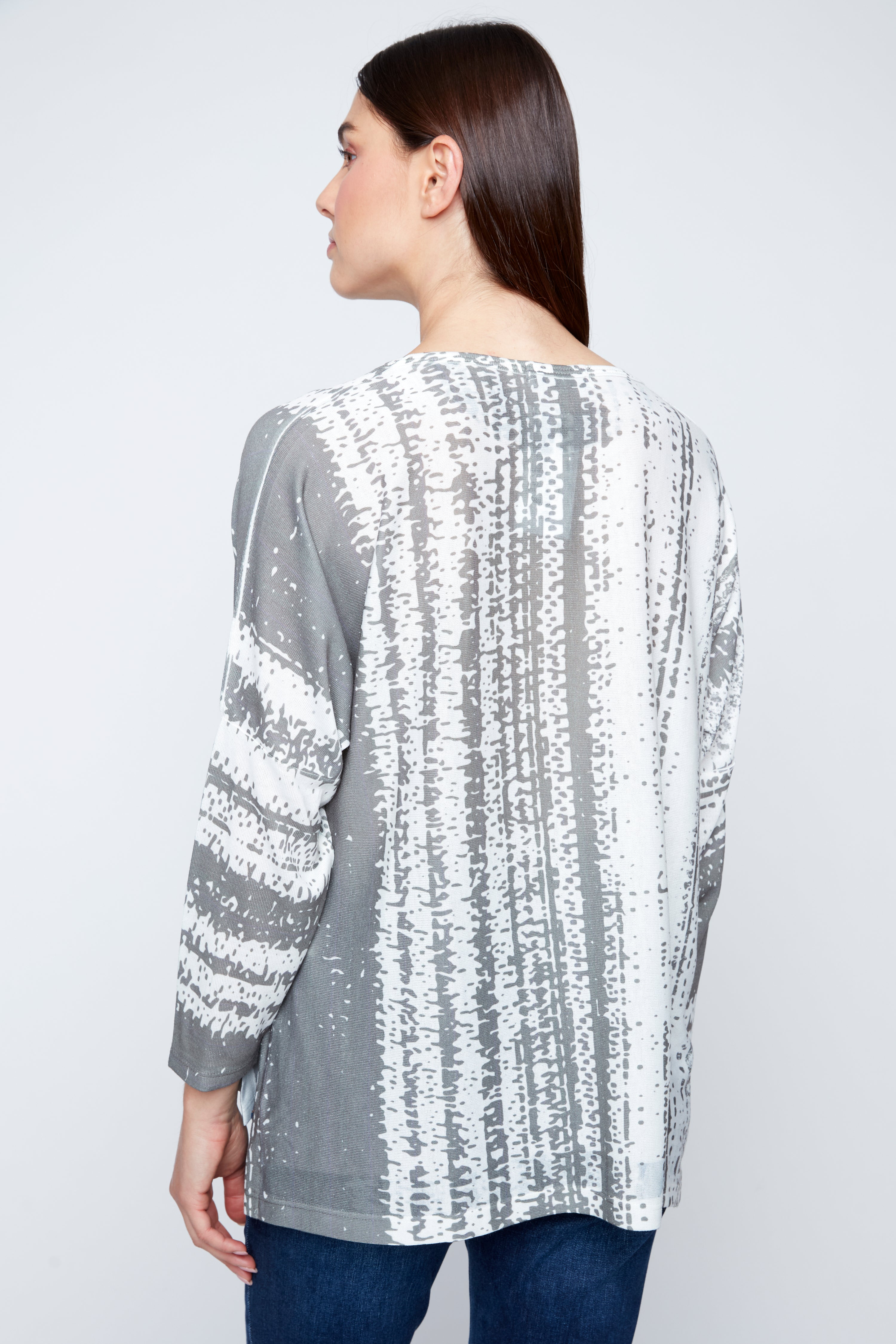 Artistic stripe and leaf pattern top