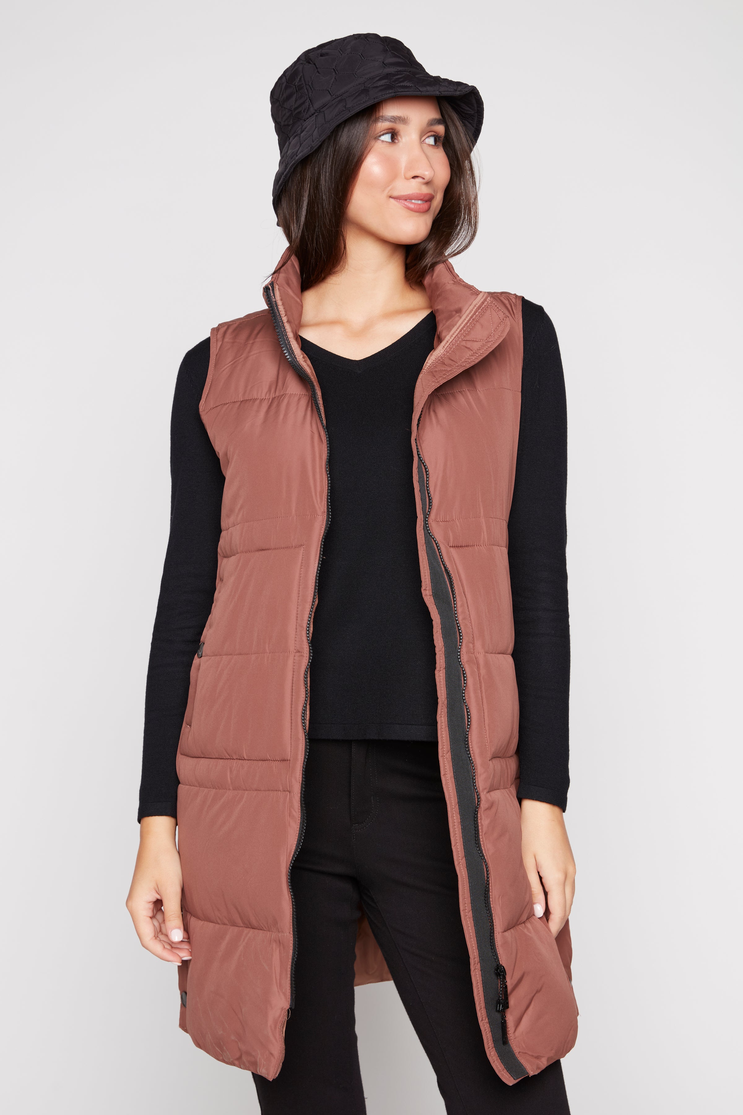 Quilted vest with sherpa hood