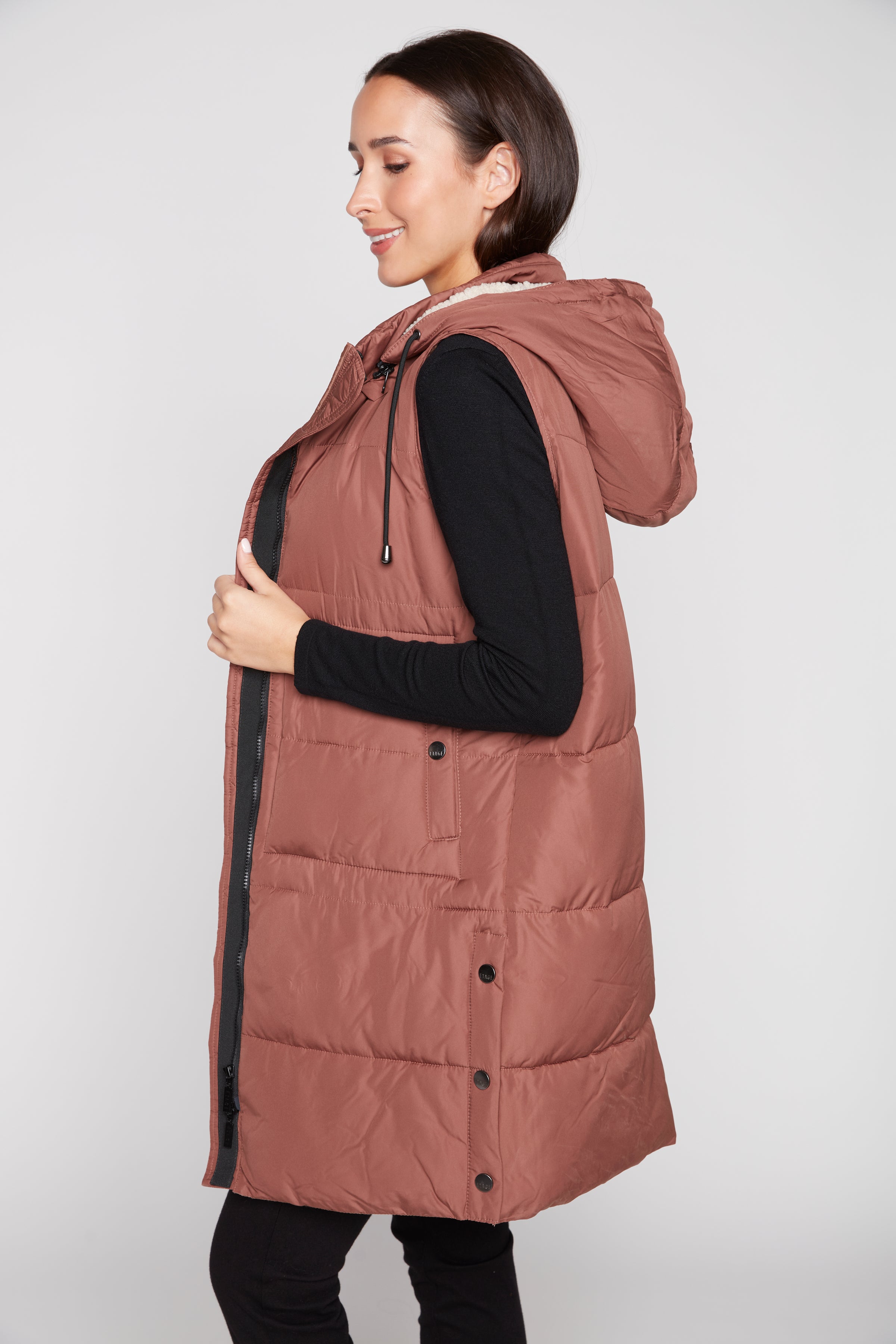 Quilted vest with sherpa hood