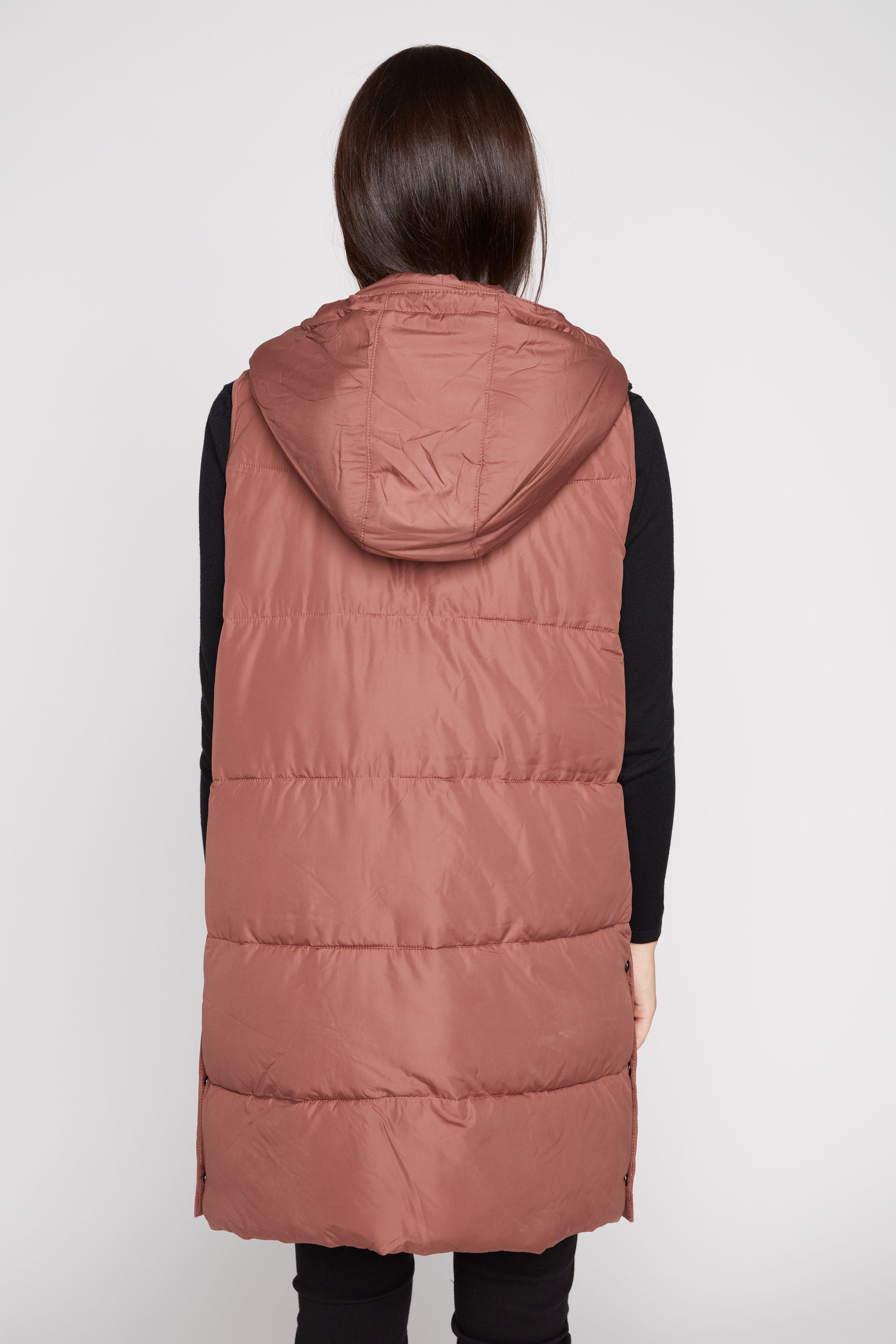 Quilted vest with sherpa hood