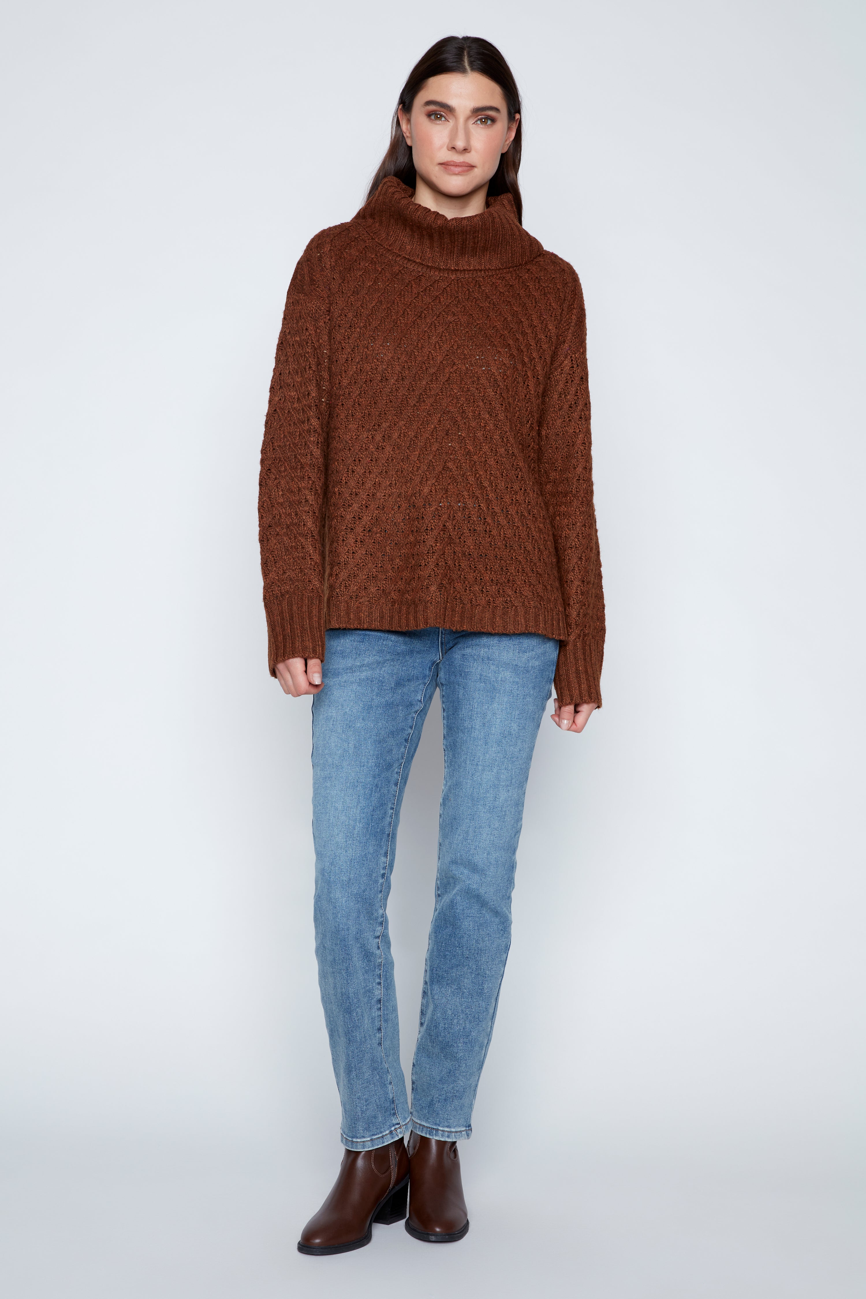 Le pull côtelé à torsades diagonales