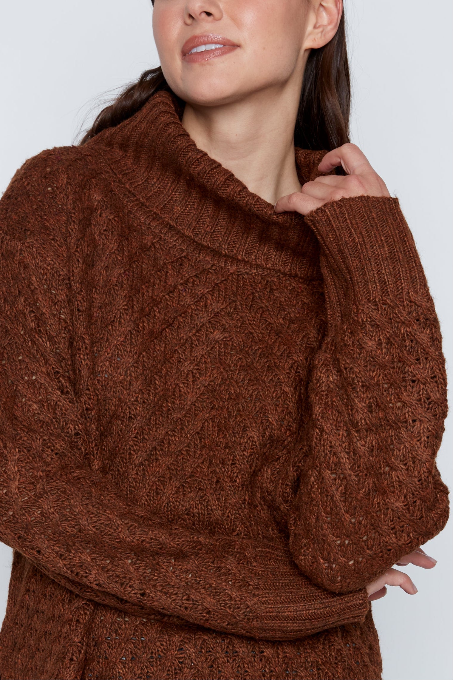 Le pull côtelé à torsades diagonales