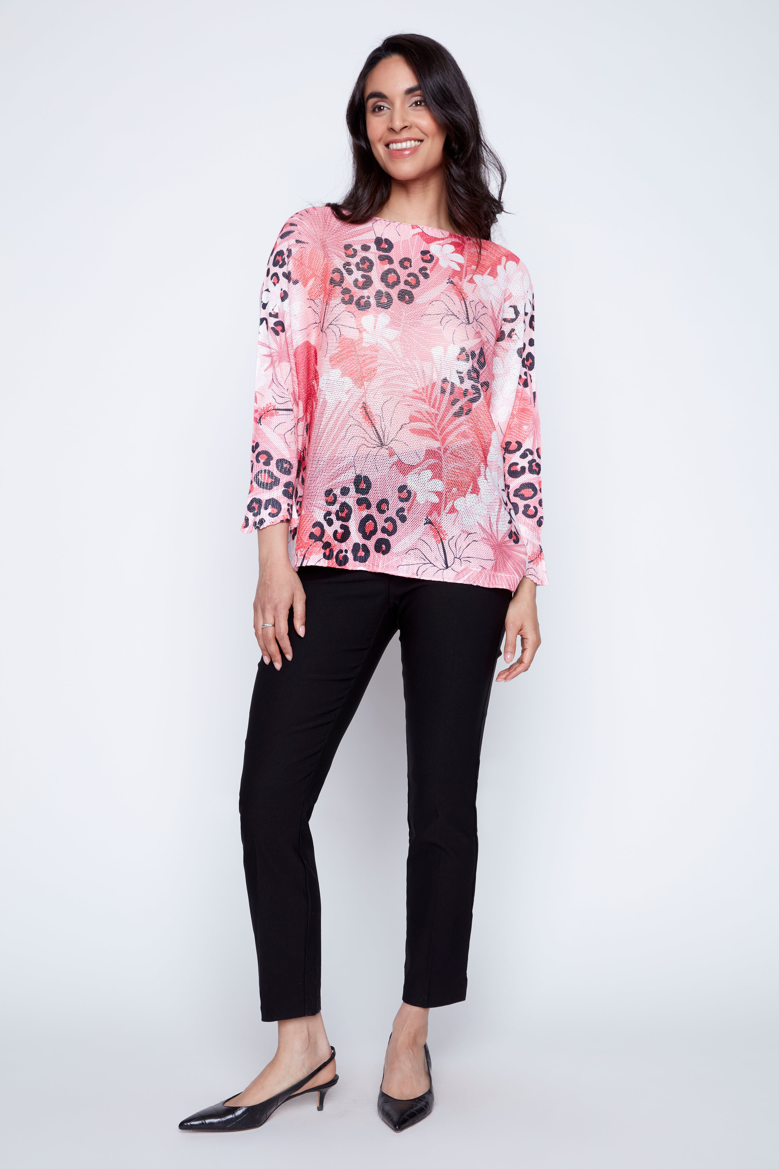 Le pull à imprimé tropical