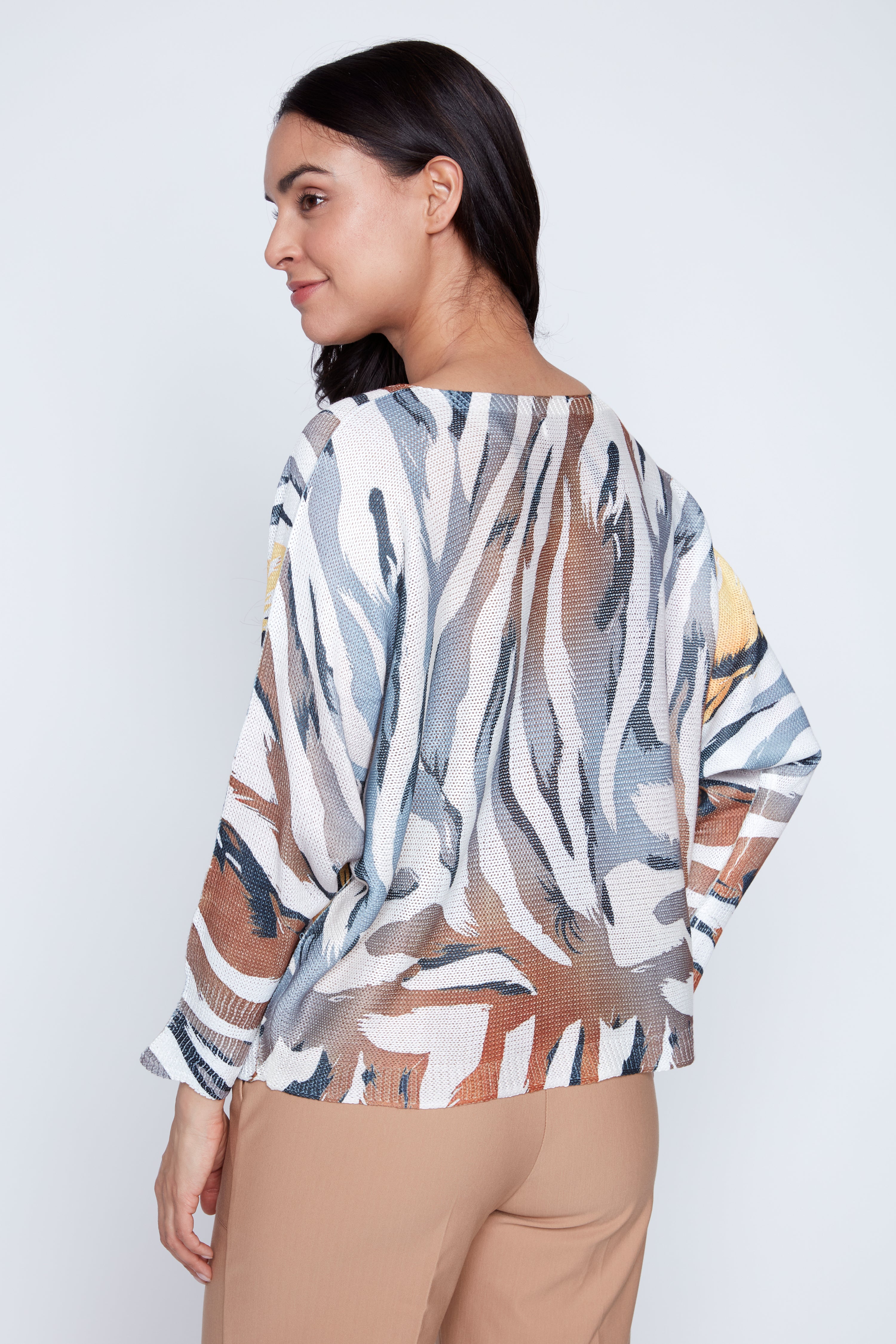 Le pull à rayures animales