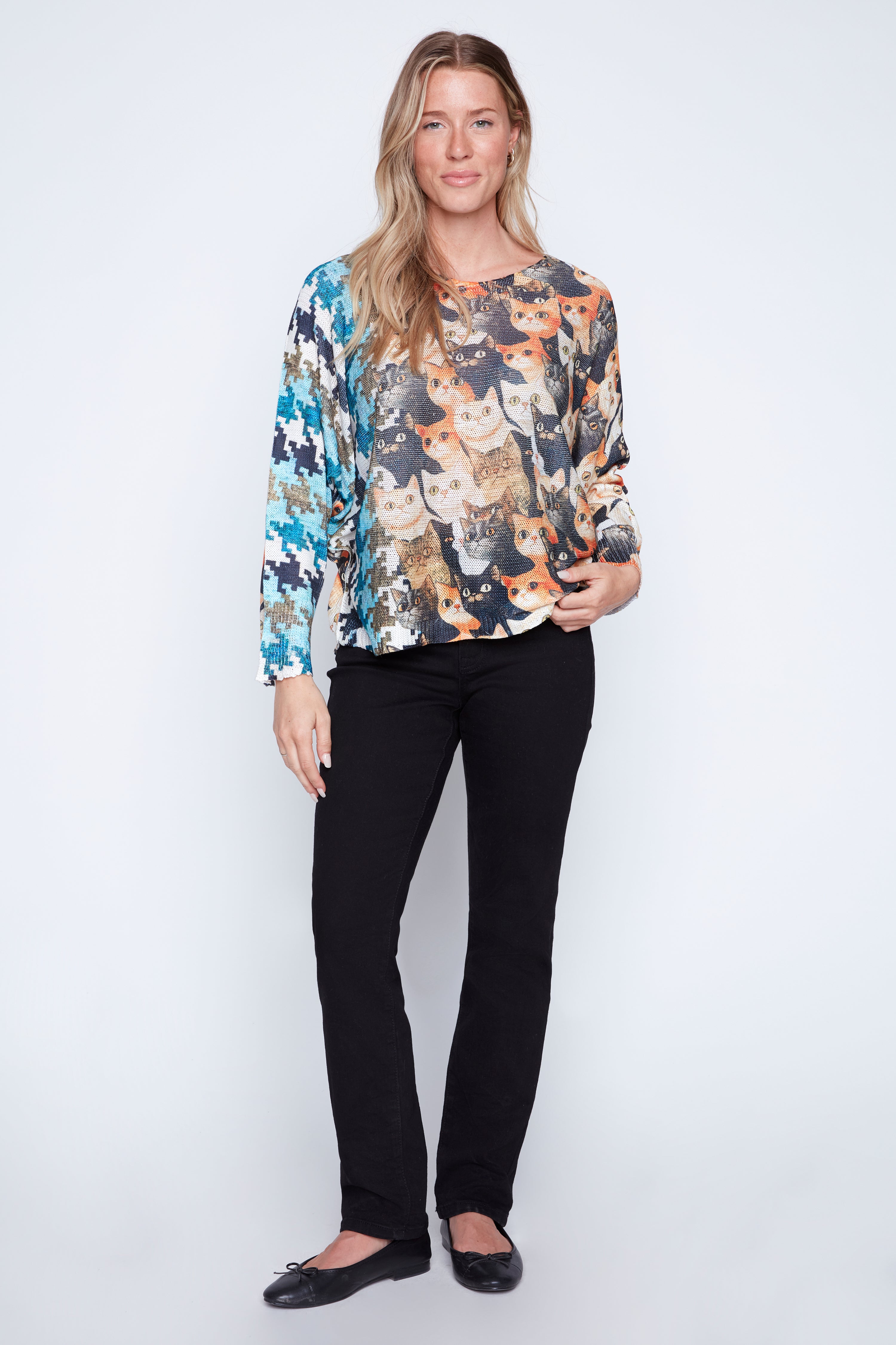 Le pull à imprimé chats