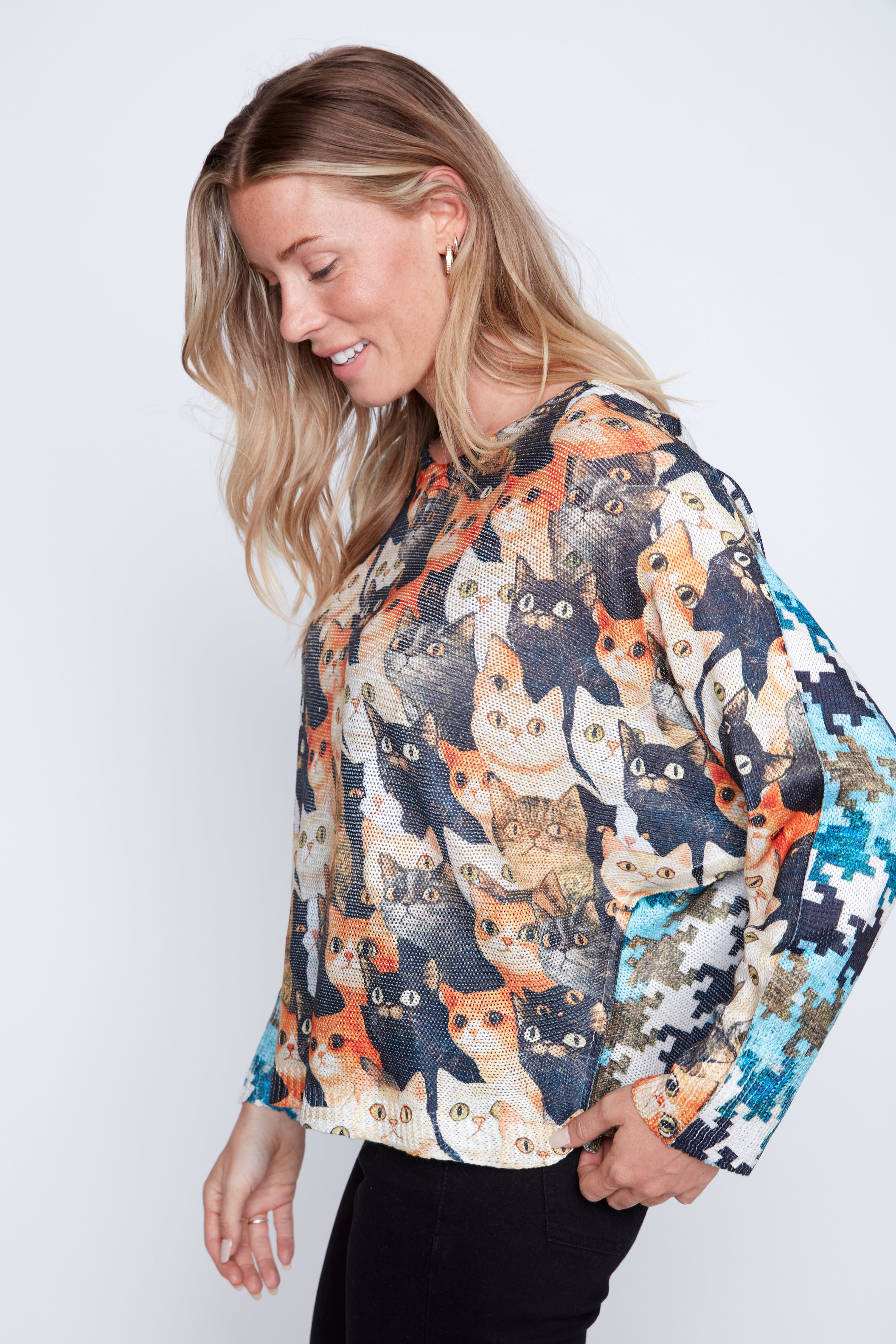 Le pull à imprimé chats